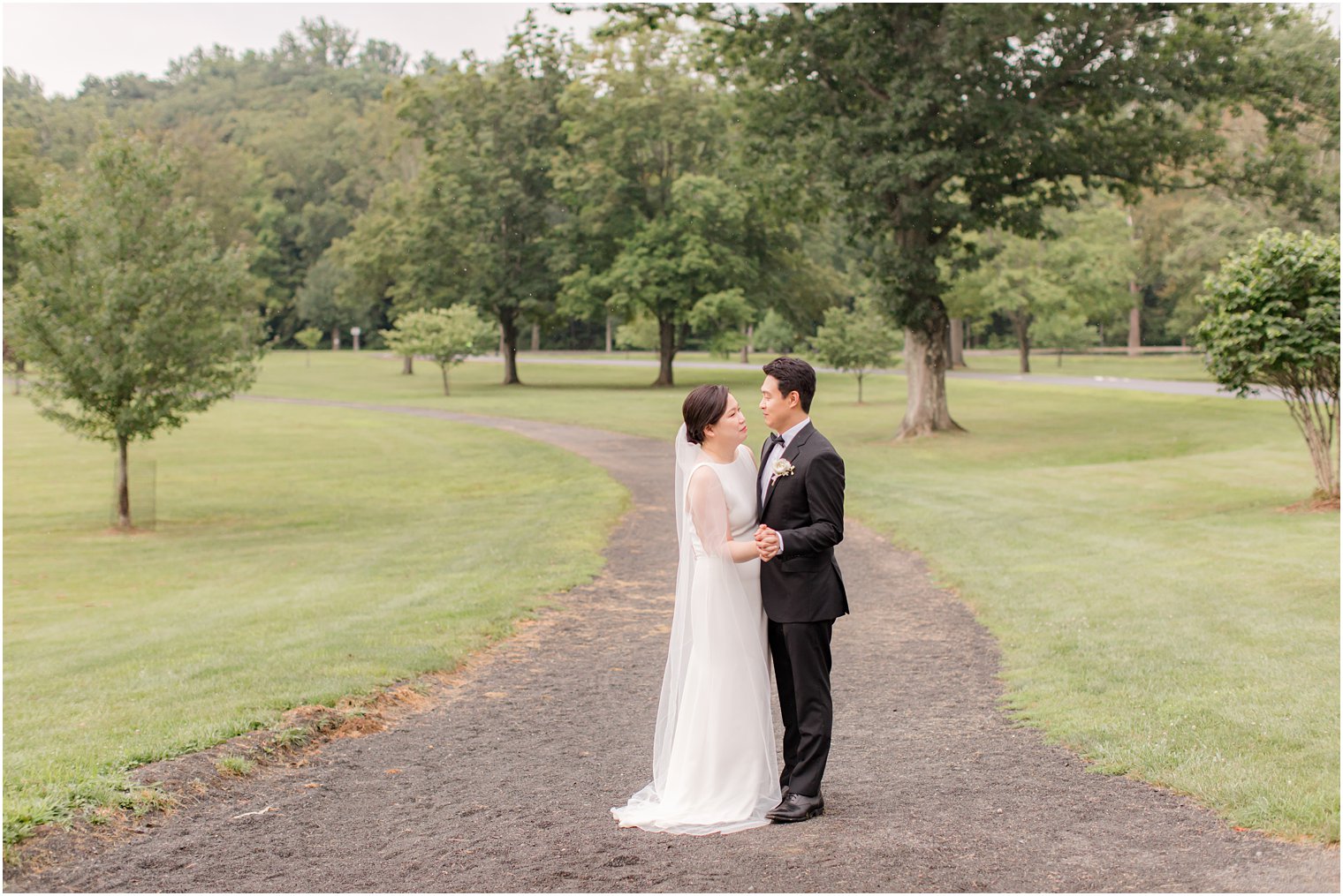 bride and groom dance in driveway during microwedding at Ninety Acres