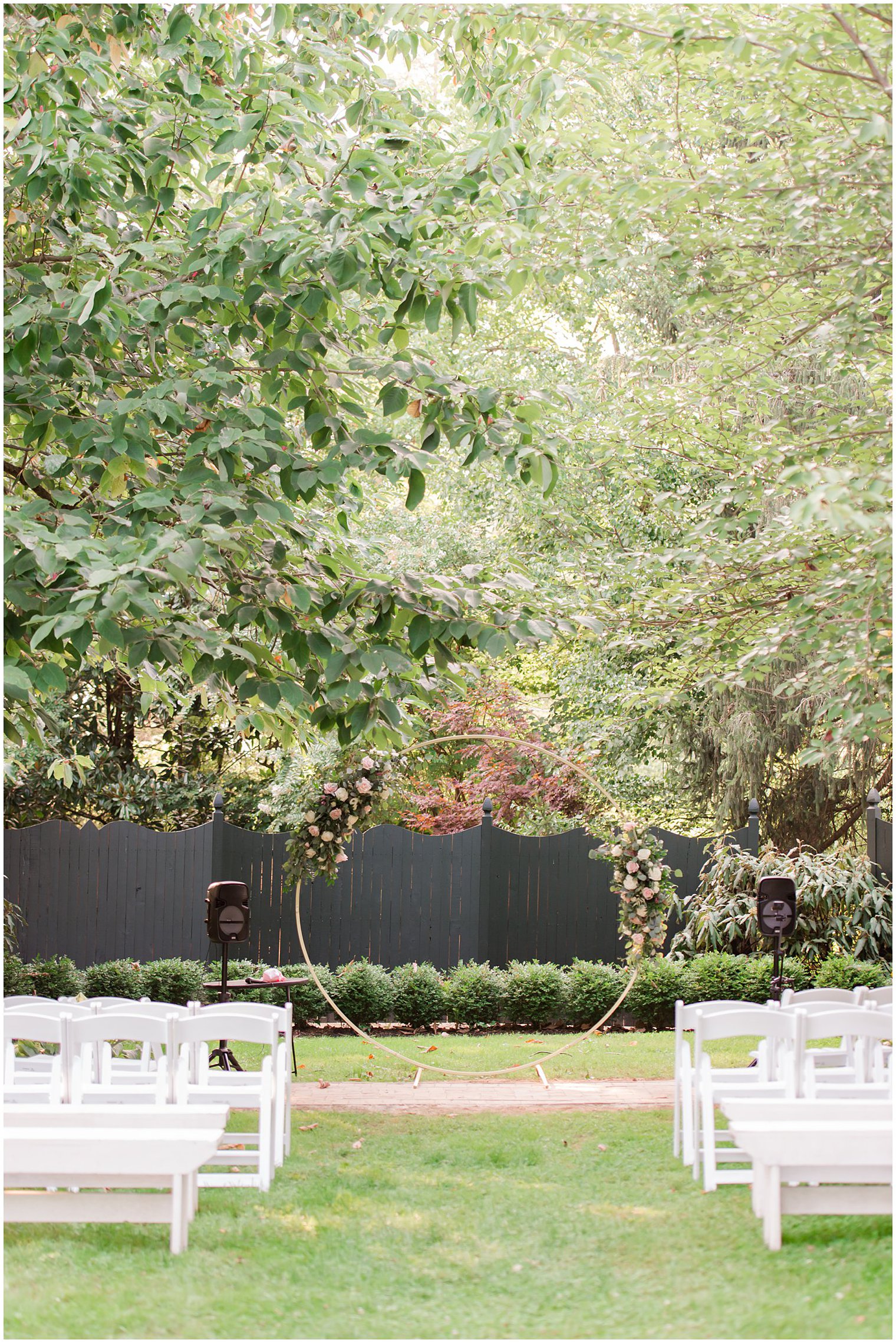 gold circular arch for ceremony at Inn at Fernbrook Farms