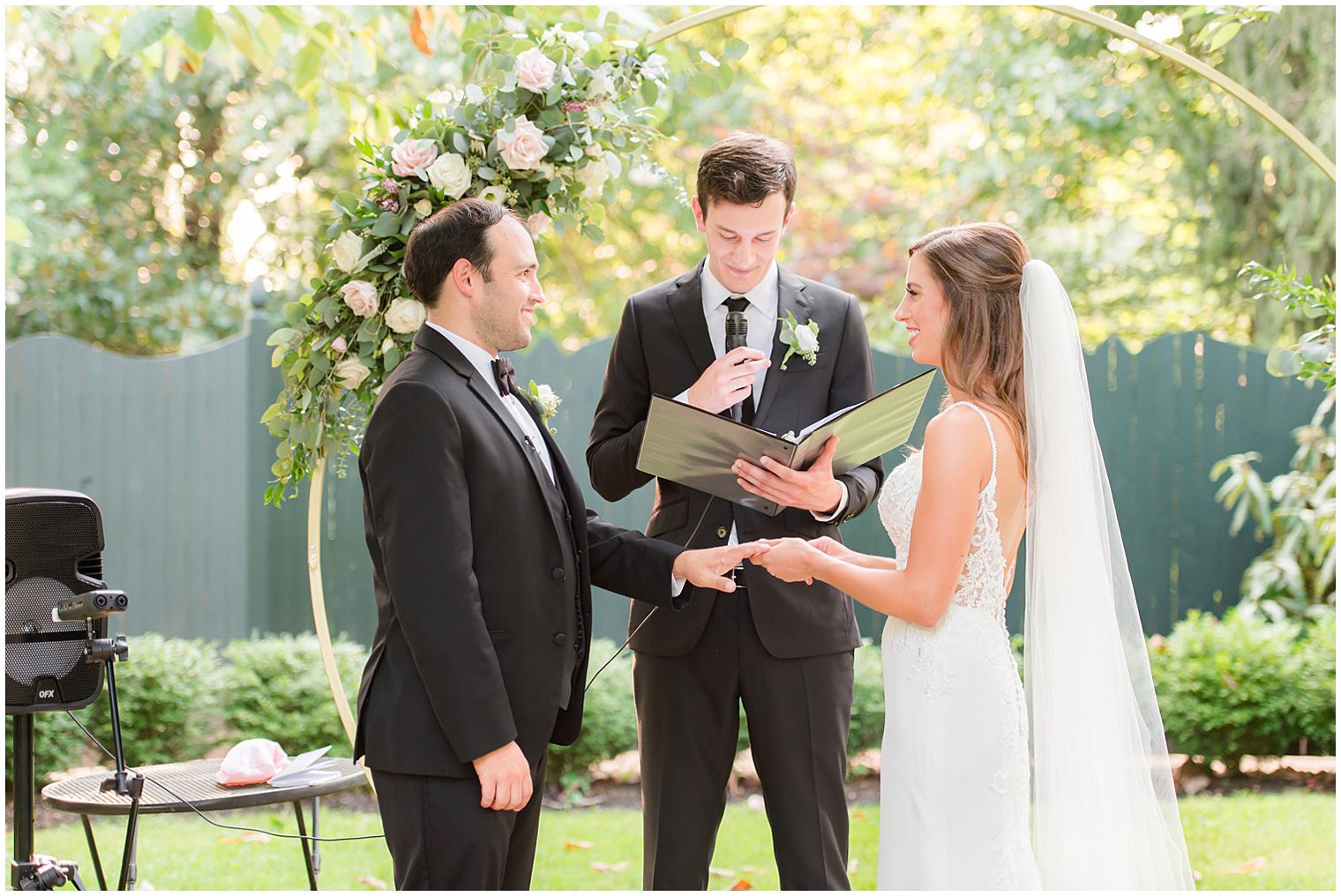 bride gives groom wedding ring during NJ ceremony