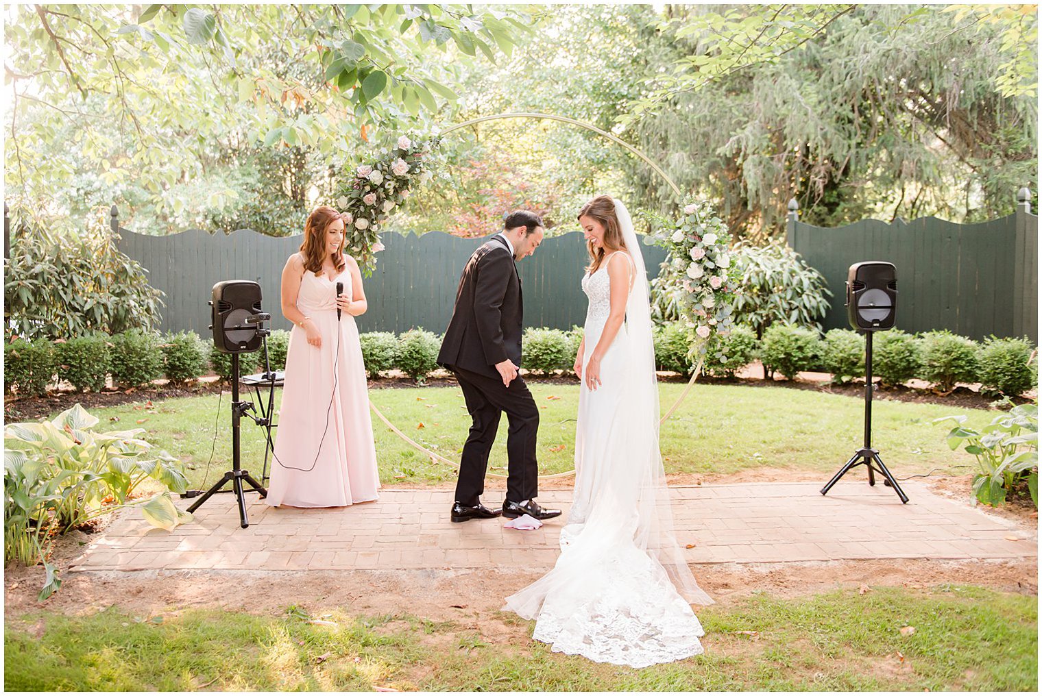 groom breaks glass during Inn at Fernbrook Farms wedding ceremony