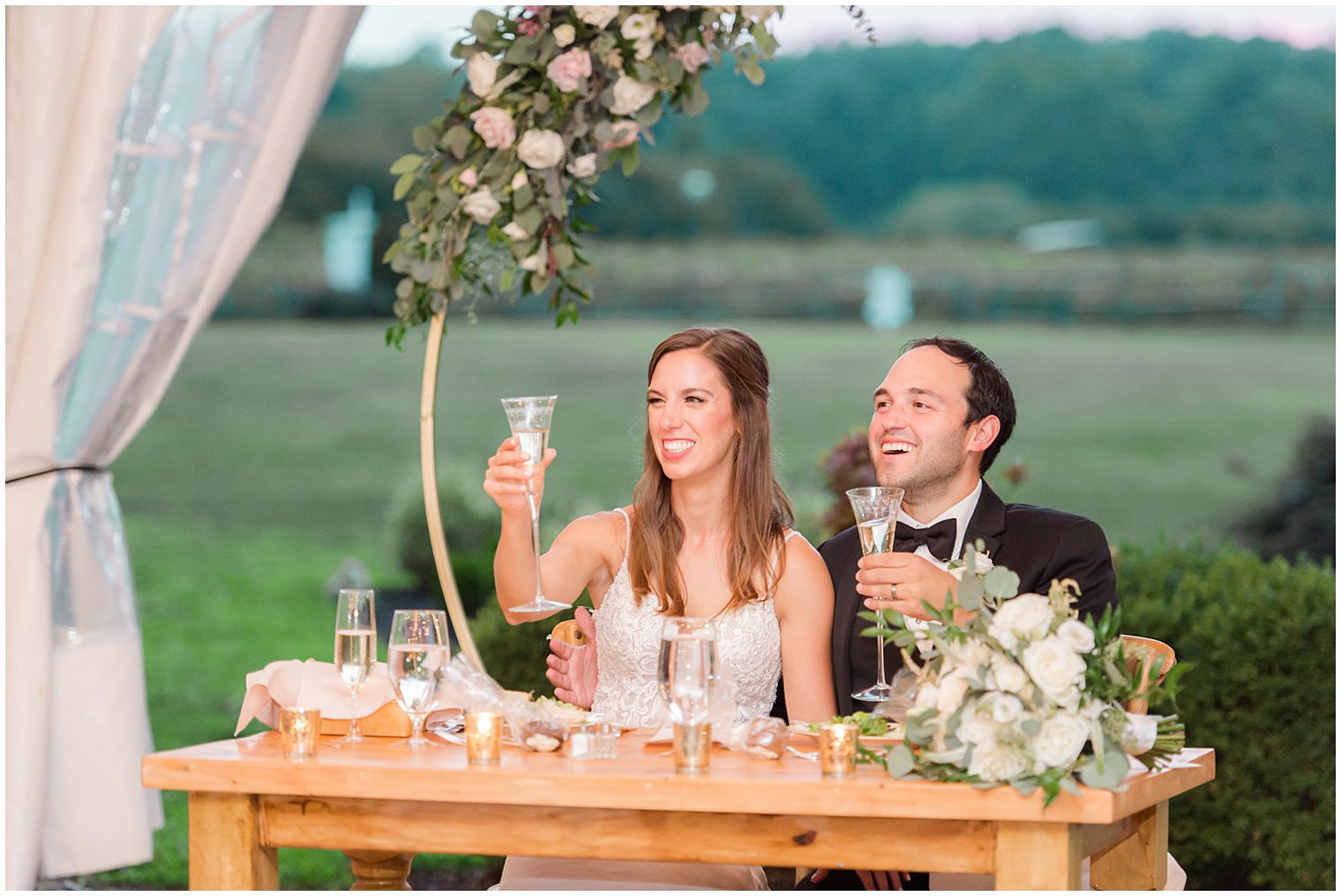 bride and groom toast champagne during Chesterfield NJ wedding reception