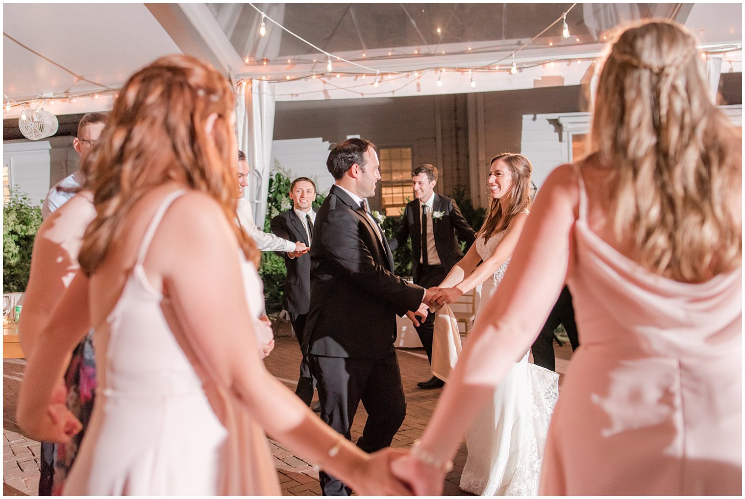 newlyweds dance with bridal party during Chesterfield NJ wedding reception