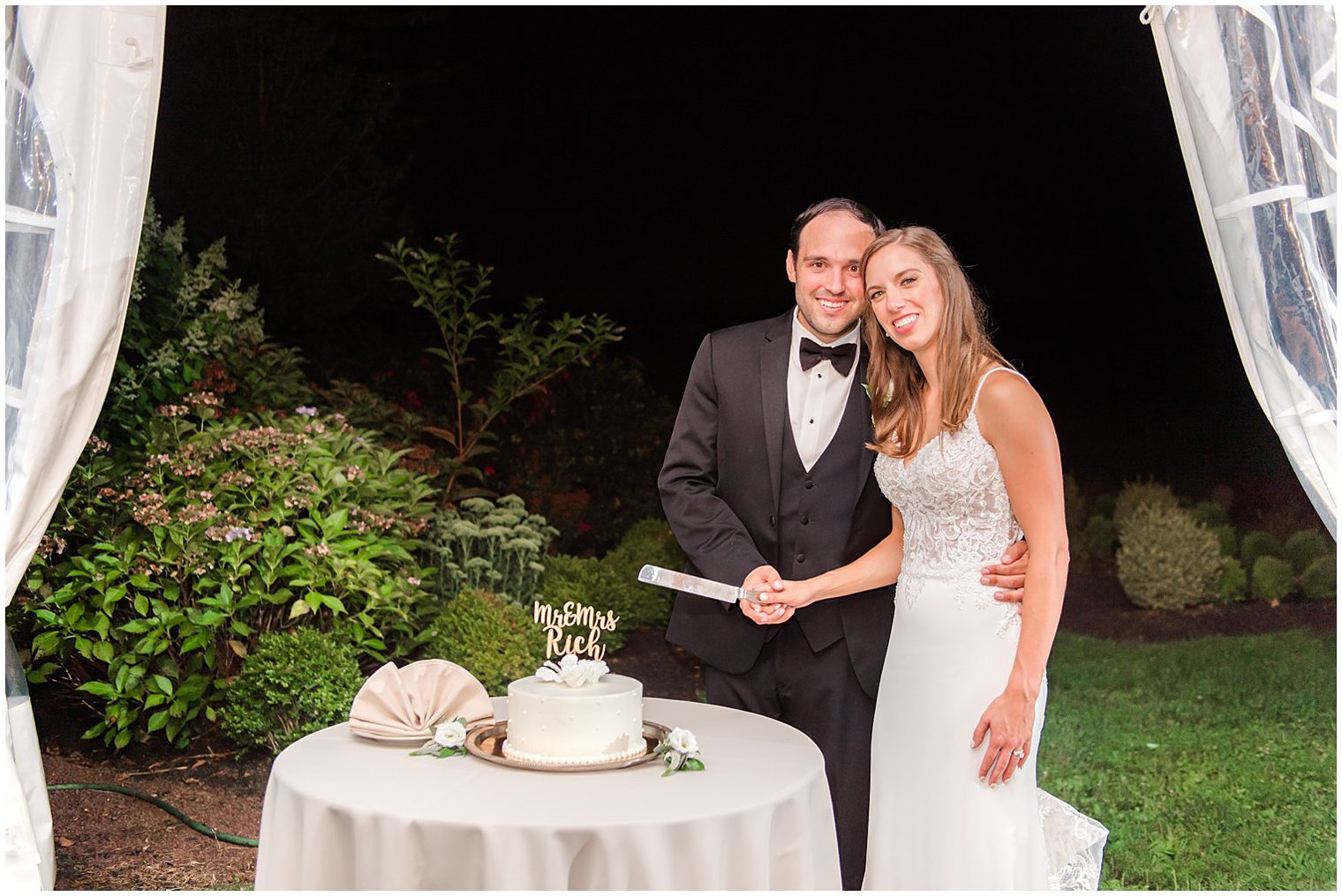 bride and groom cut wedding cake during Chesterfield NJ wedding reception