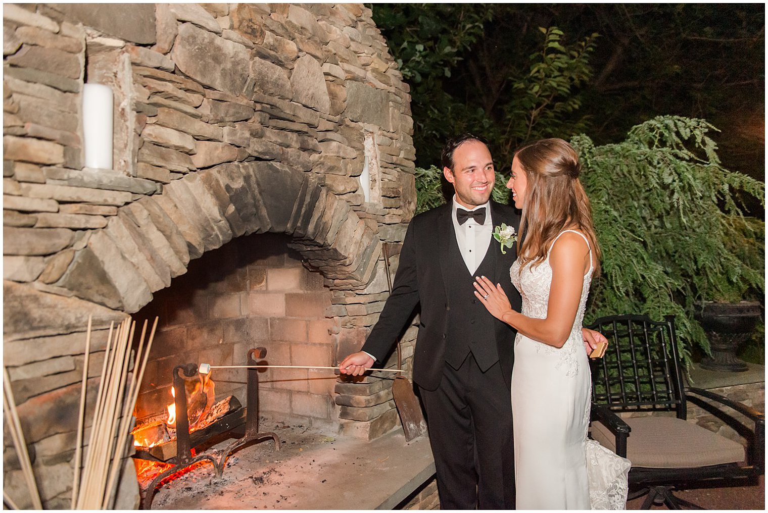 newlyweds roast marshmallows in stone over at the Inn at Fernbrook Farms