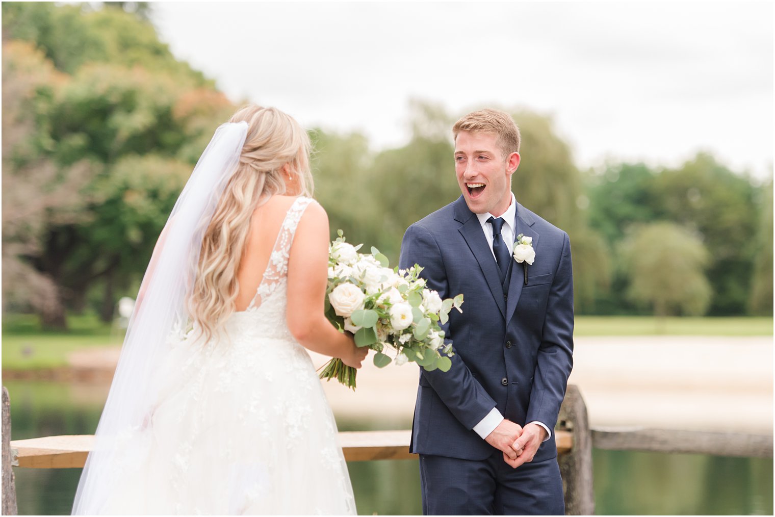 groom reacts to seeing bride during first look
