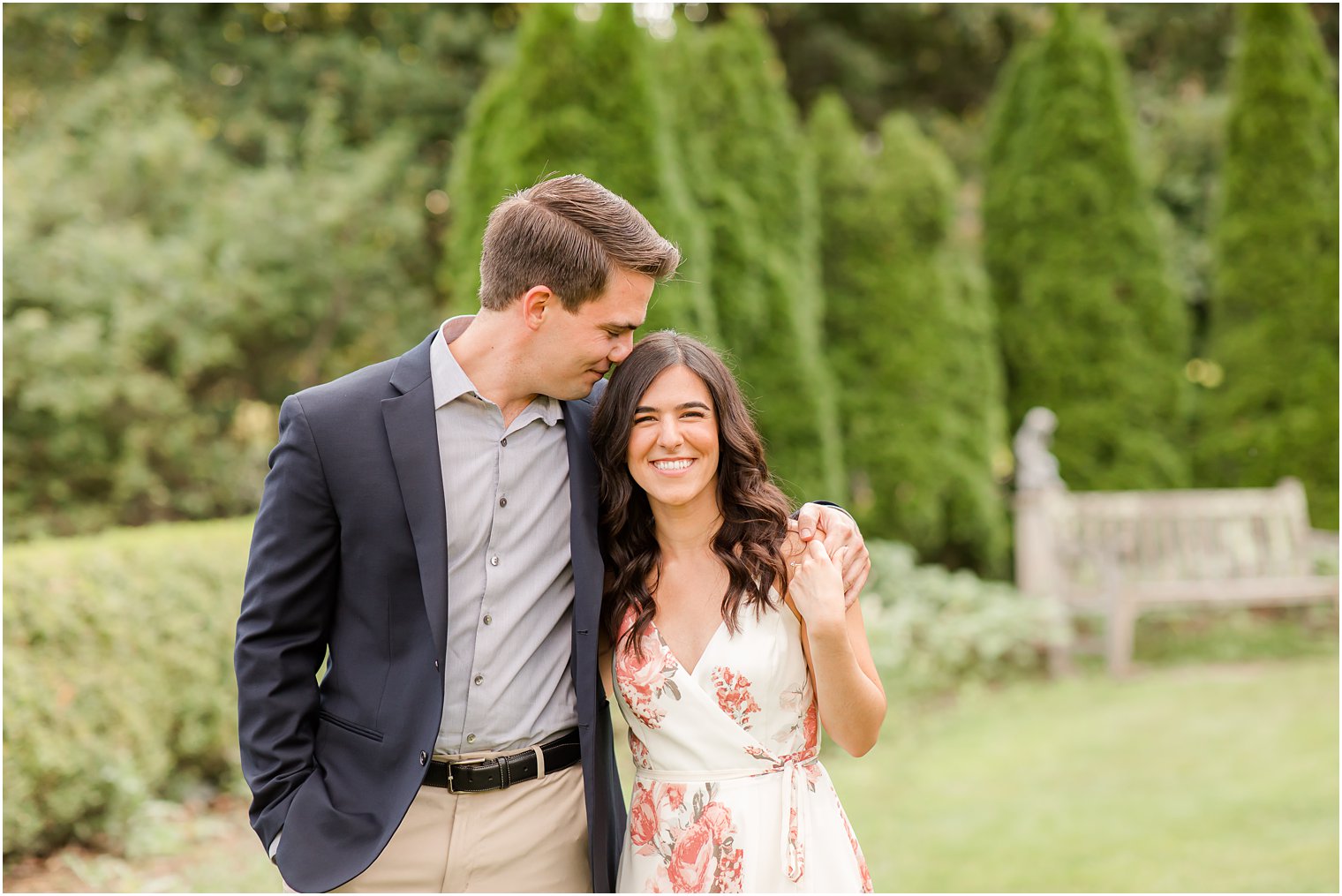 bride and groom hold hands walking through Skylands Manor