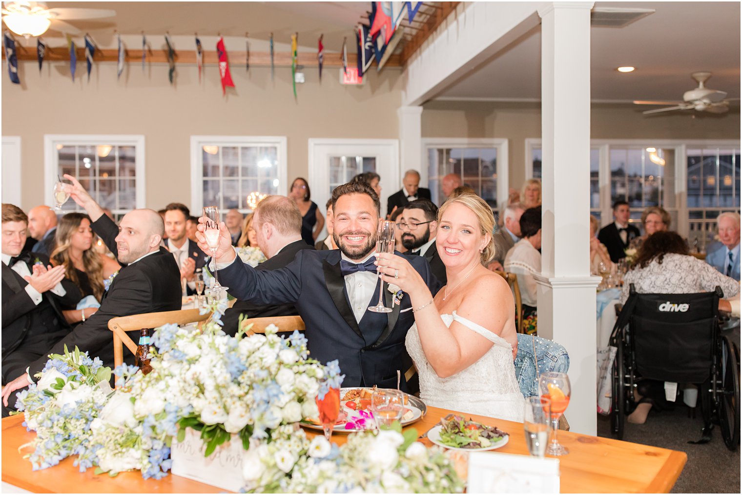 newlyweds toast during NJ wedding reception on LBI