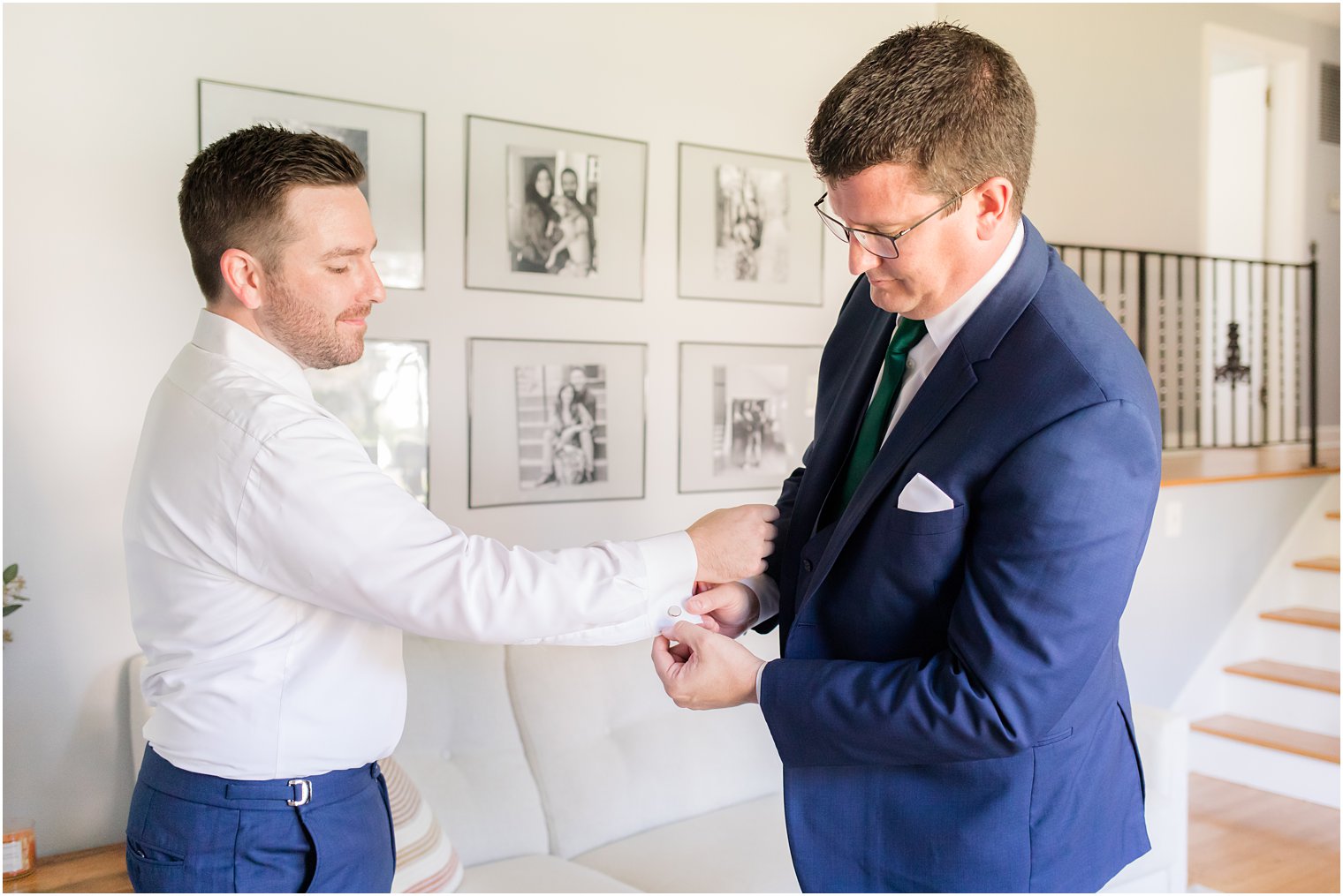 groomsman helps groom with cufflinks at Princeton NJ home 