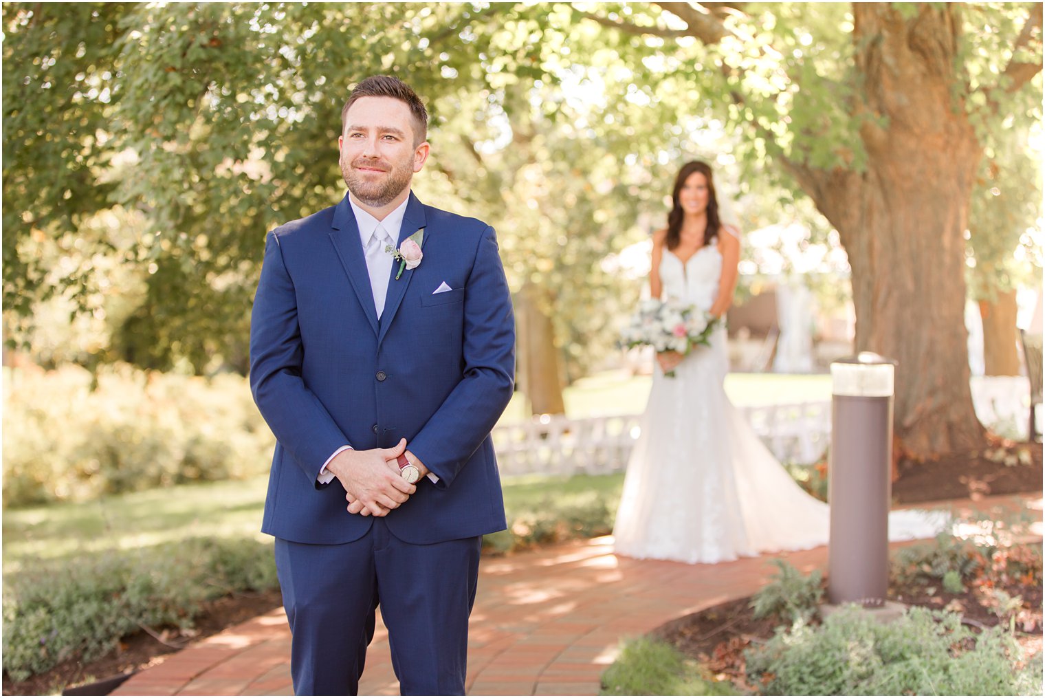 bride walks up to groom during first look at the Chauncey Hotel