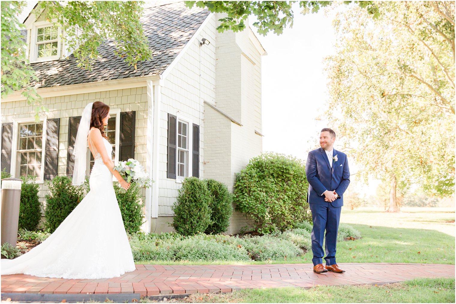 groom turns to see bride during first look at the Chauncey Hotel