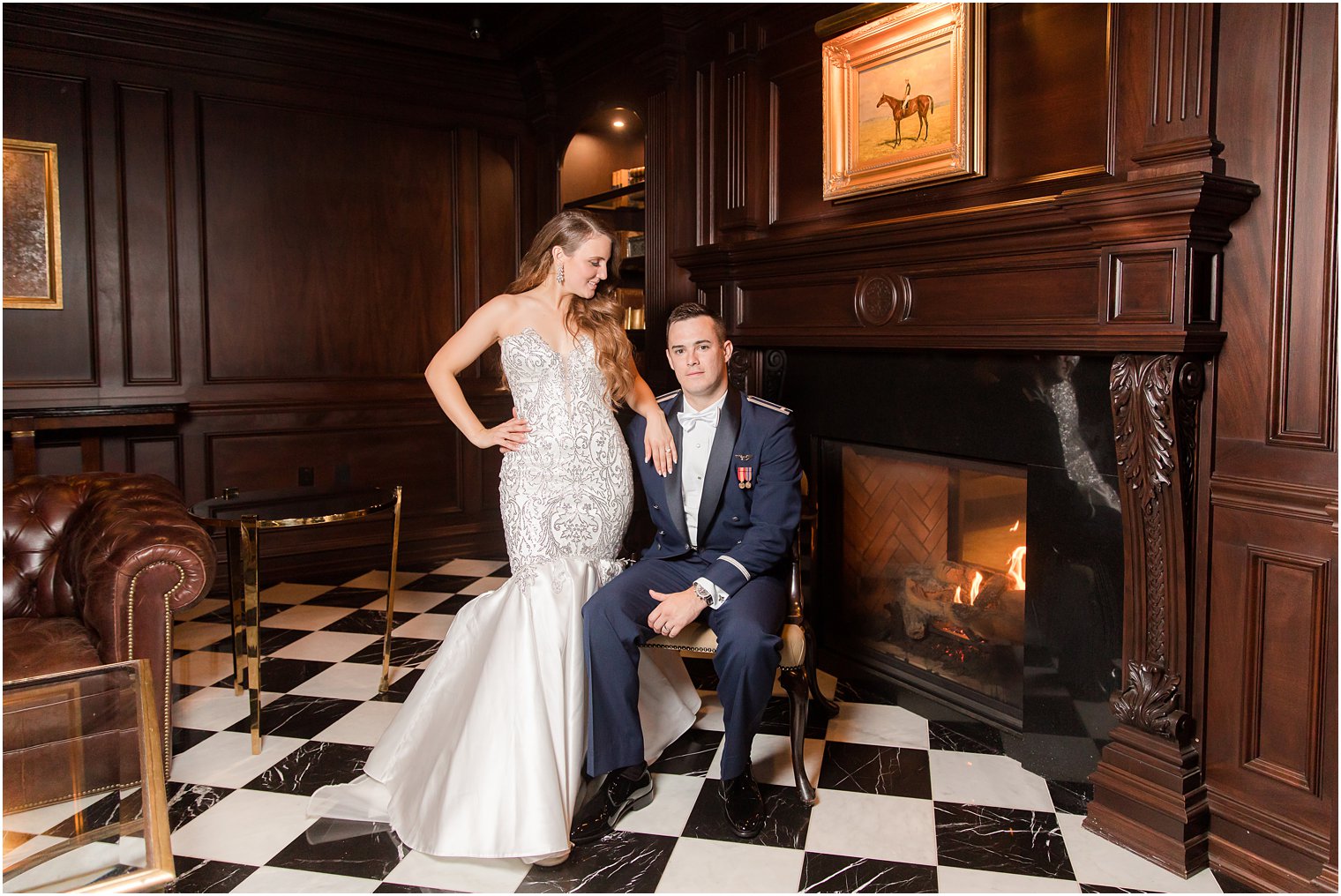 bride and groom pose in drawing room at Park Chateau Estate