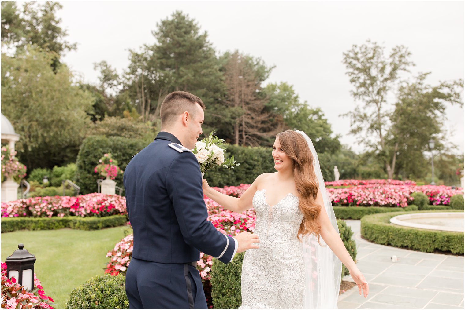 groom hugs bride during first look at Park Chateau Estate