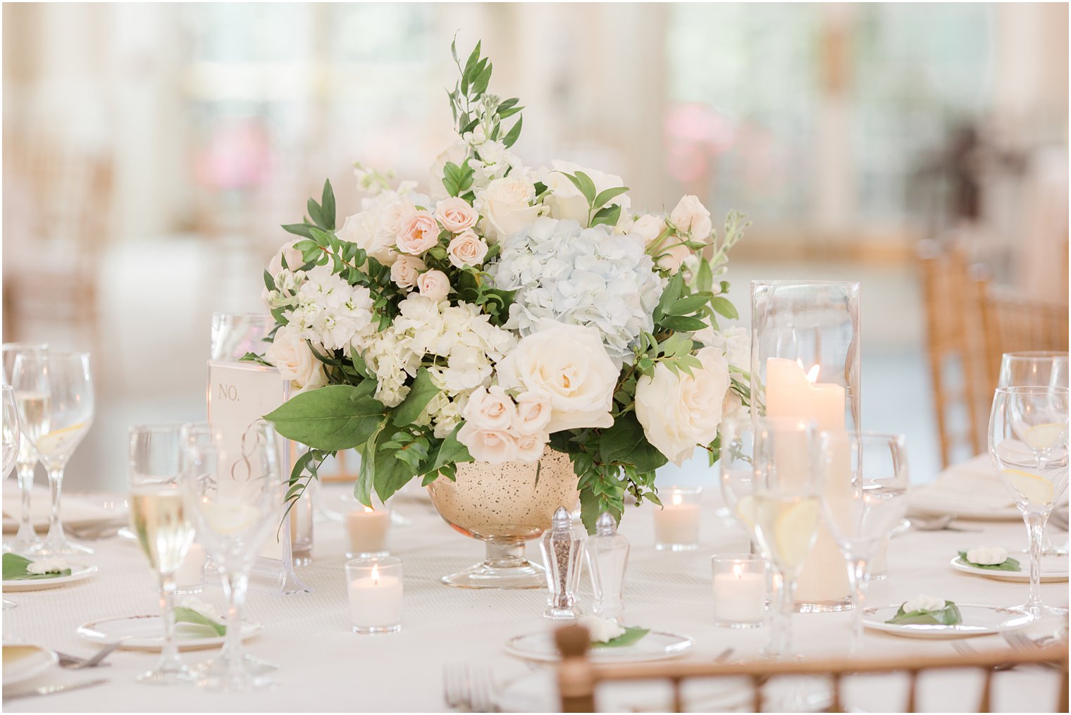 ivory and pastel pink flowers for centerpieces at Park Chateau Estate