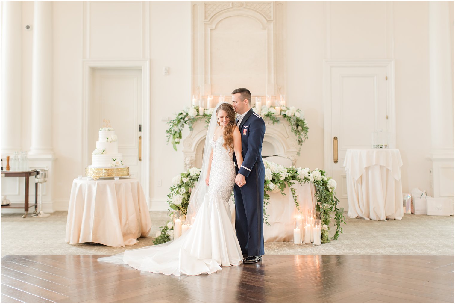 bride and groom stand by sweetheart table at Park Chateau Estate