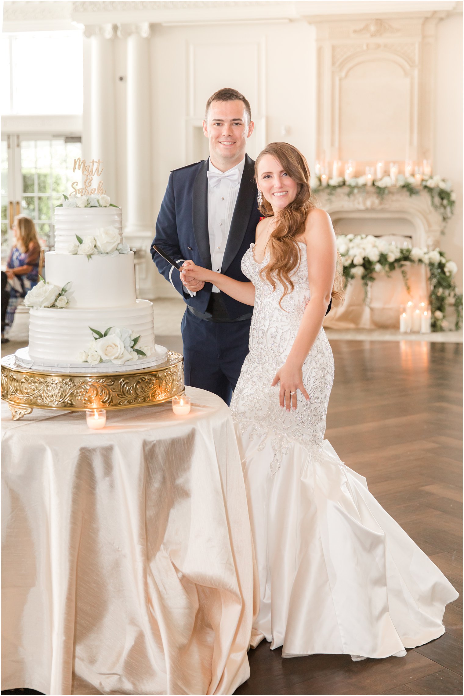 bride and groom cut wedding cake in East Brunswick NJ 