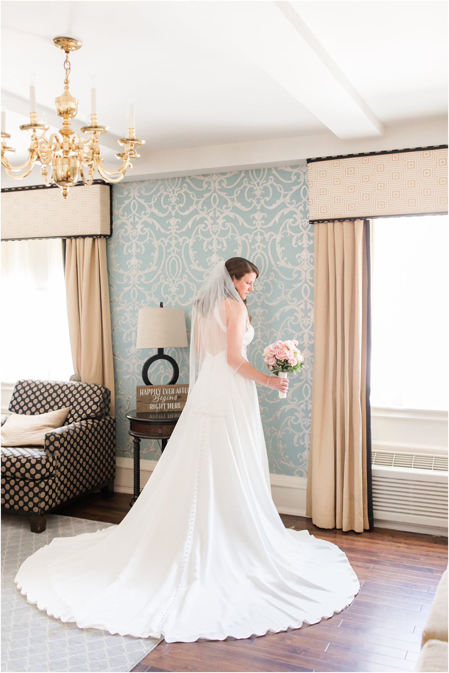 bride poses in suite at Molly Pitcher Inn
