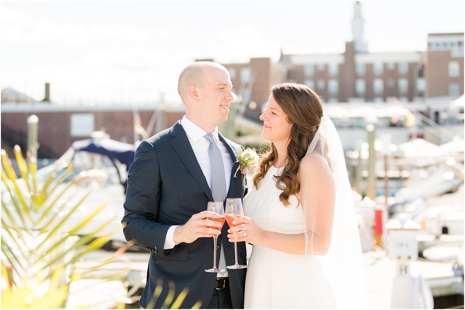 newlyweds toast with champagne on wedding day