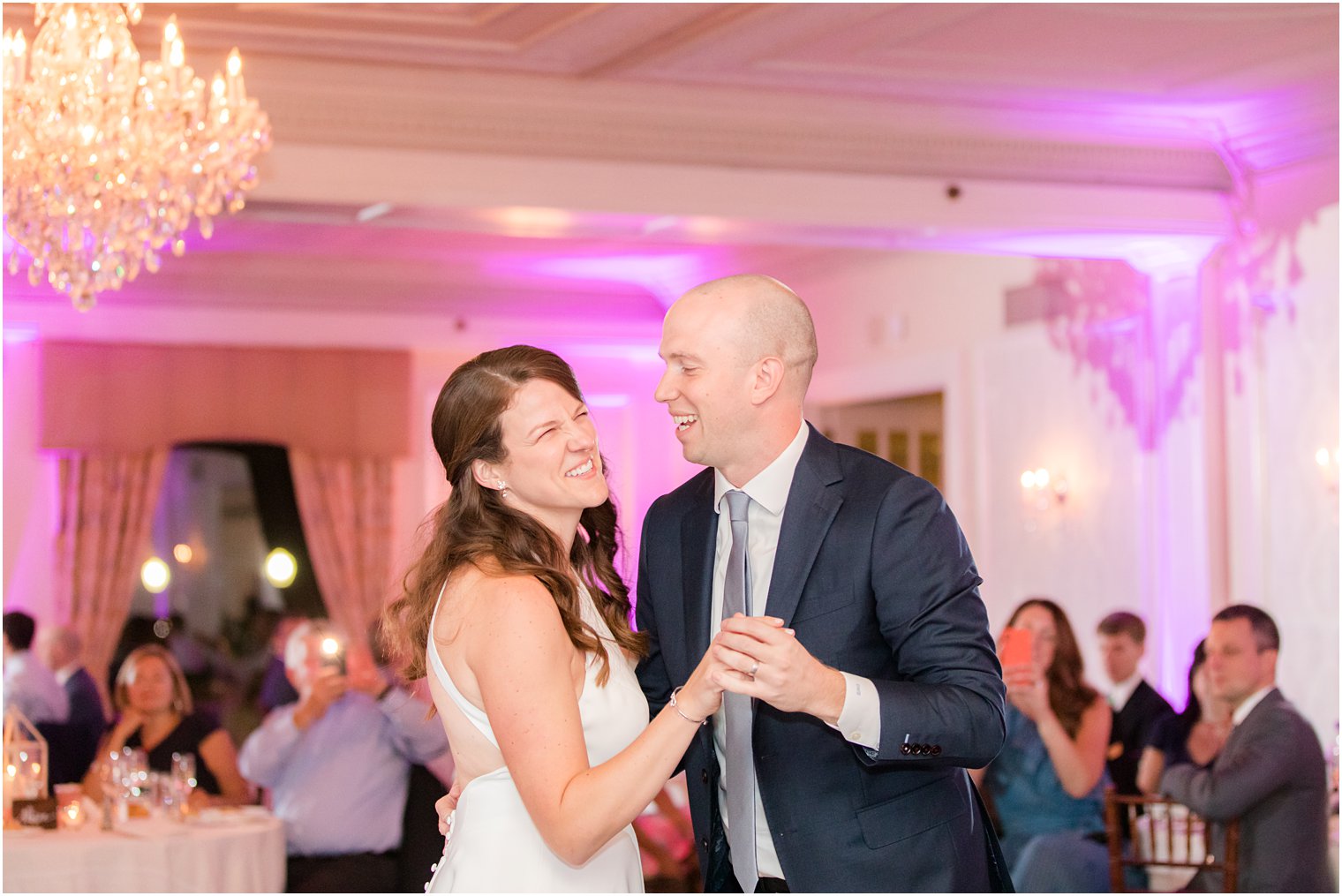 newlyweds laugh during first dance at Red Bank NJ wedding reception