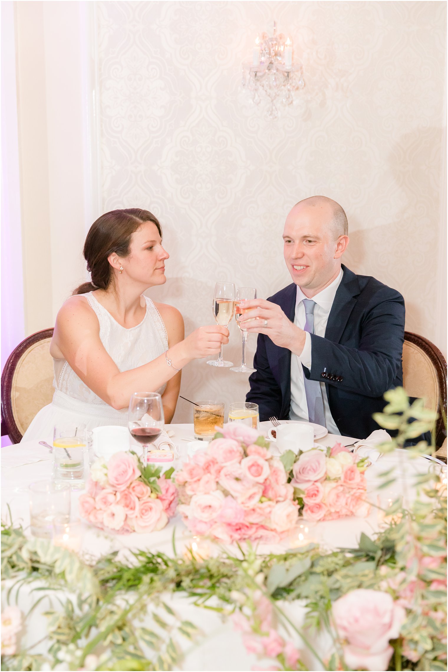 bride and groom toast champagne during Red Bank NJ wedding reception