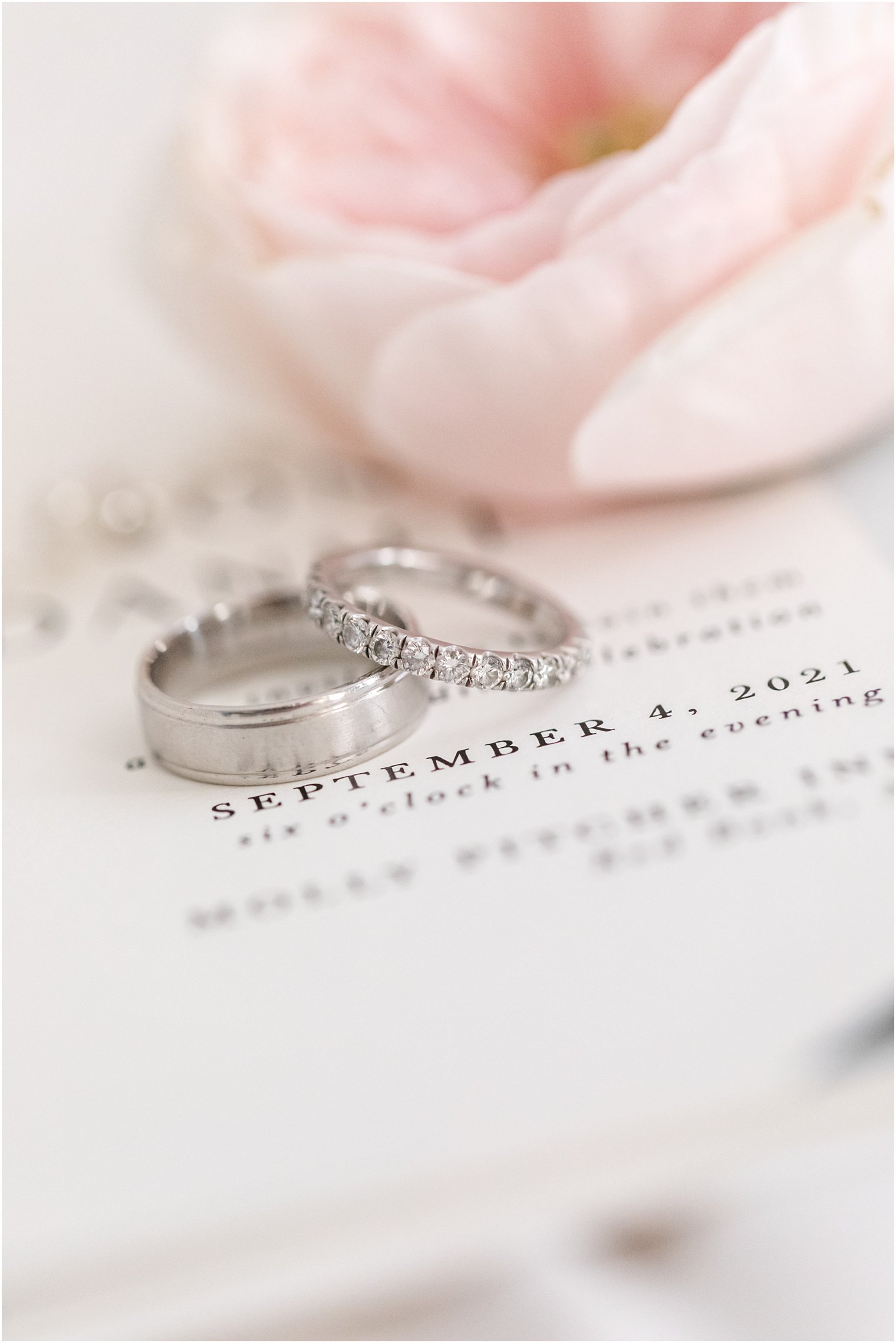 wedding bands lay on wedding invitation for Molly Pitcher Inn wedding day