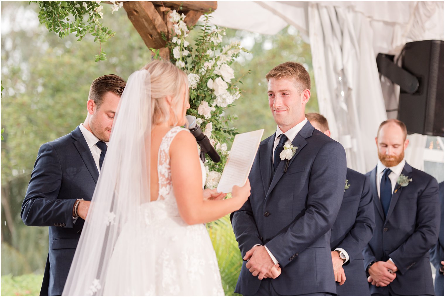 bride reads vows to groom during NJ wedding ceremony