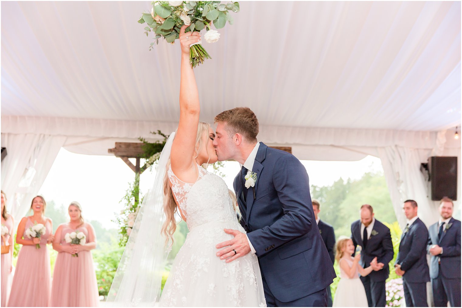 bride and groom cheer during wedding ceremony 