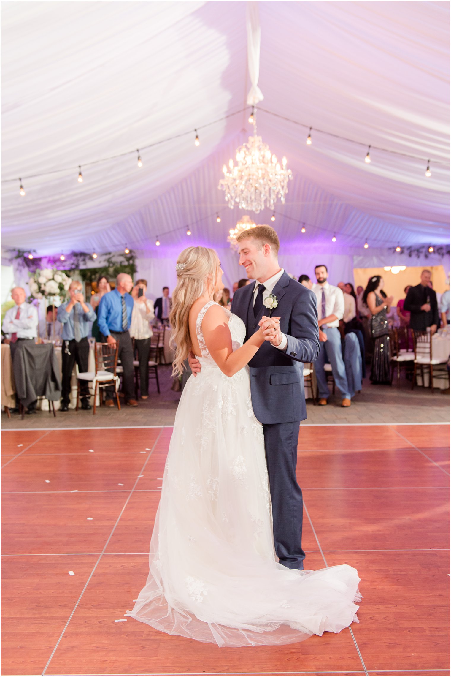 newlyweds dance during Windows on the Water at Frogbridge Wedding reception 