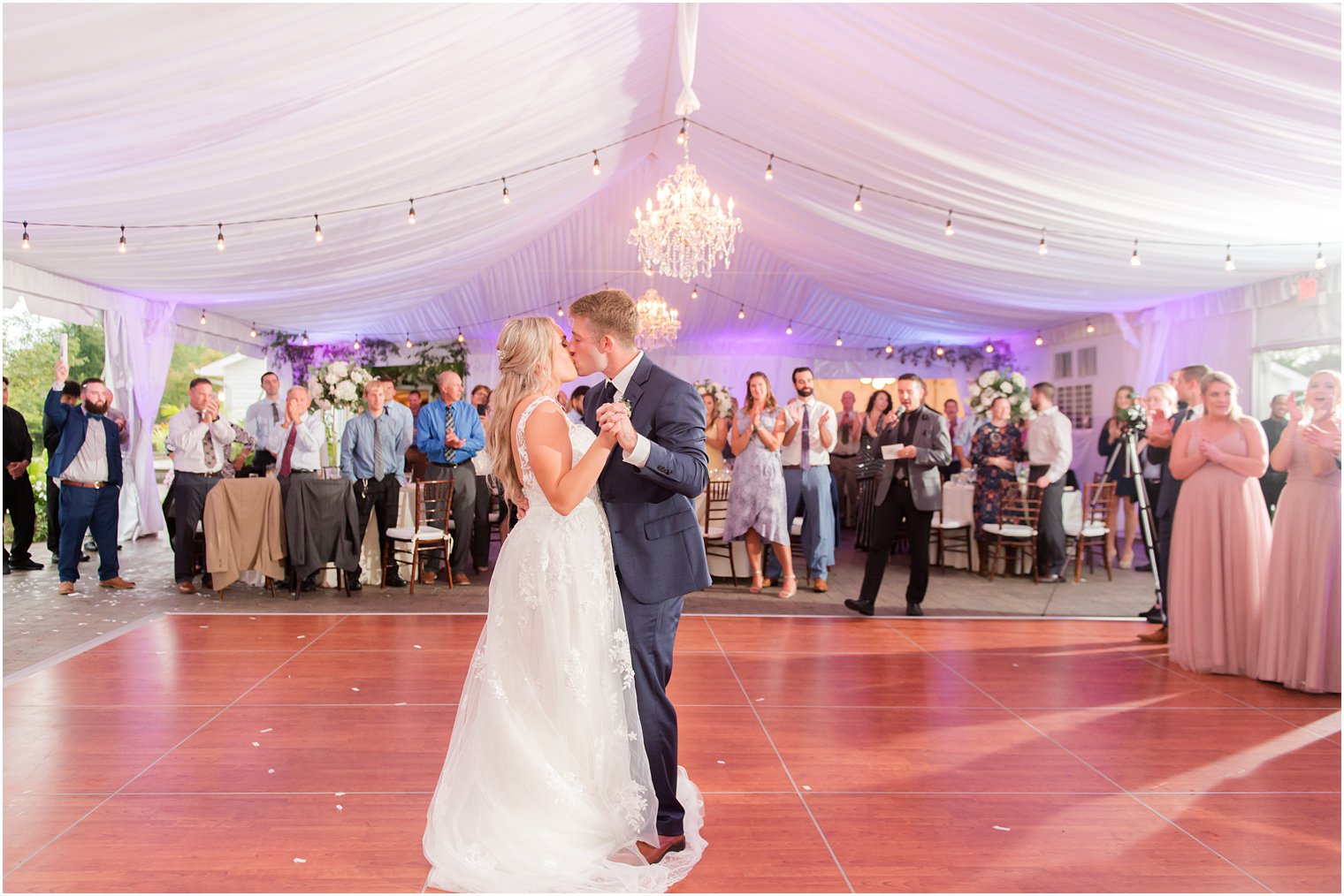 newlyweds kiss during first dance at NJ wedding reception 