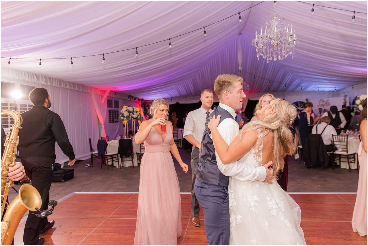 groom dances with bride during NJ wedding reception 