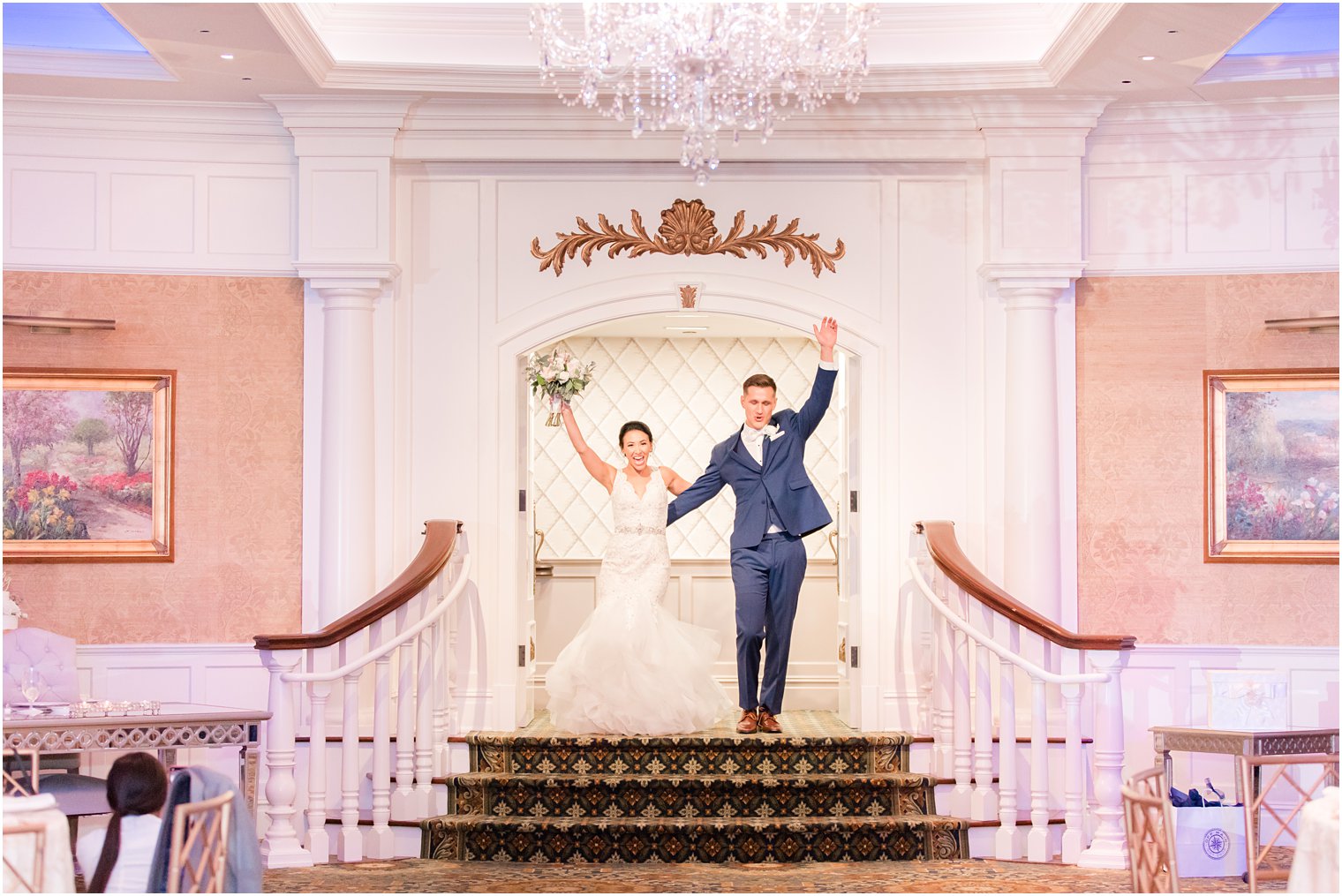 bride and groom cheer entering Delran NJ wedding reception