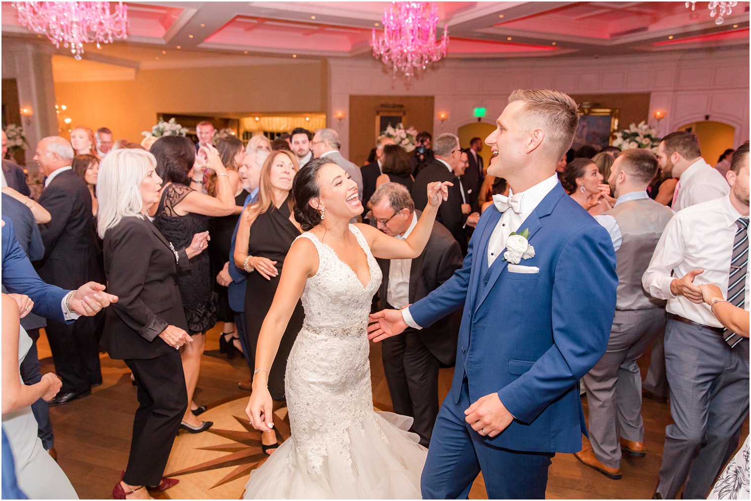 newlyweds dance with guests during Delran NJ wedding reception