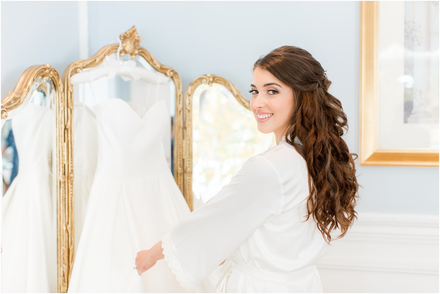 bride looks over shoulder during Farmingdale NJ wedding prep