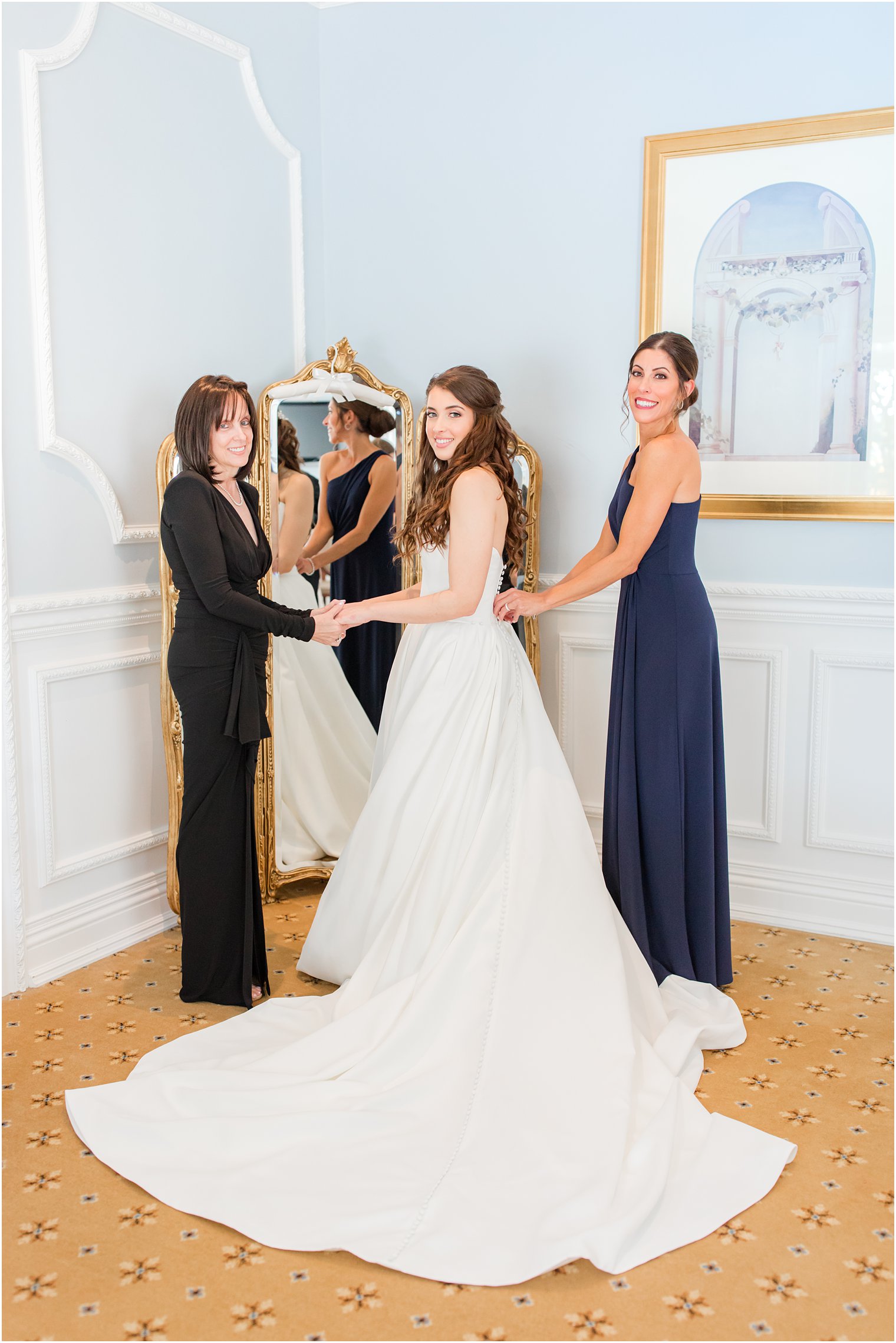 mom and sister help bride prepare for Farmingdale NJ wedding