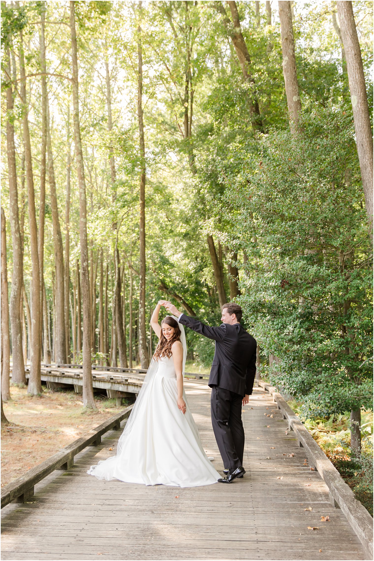 groom twirls bride during first look in New Jersey