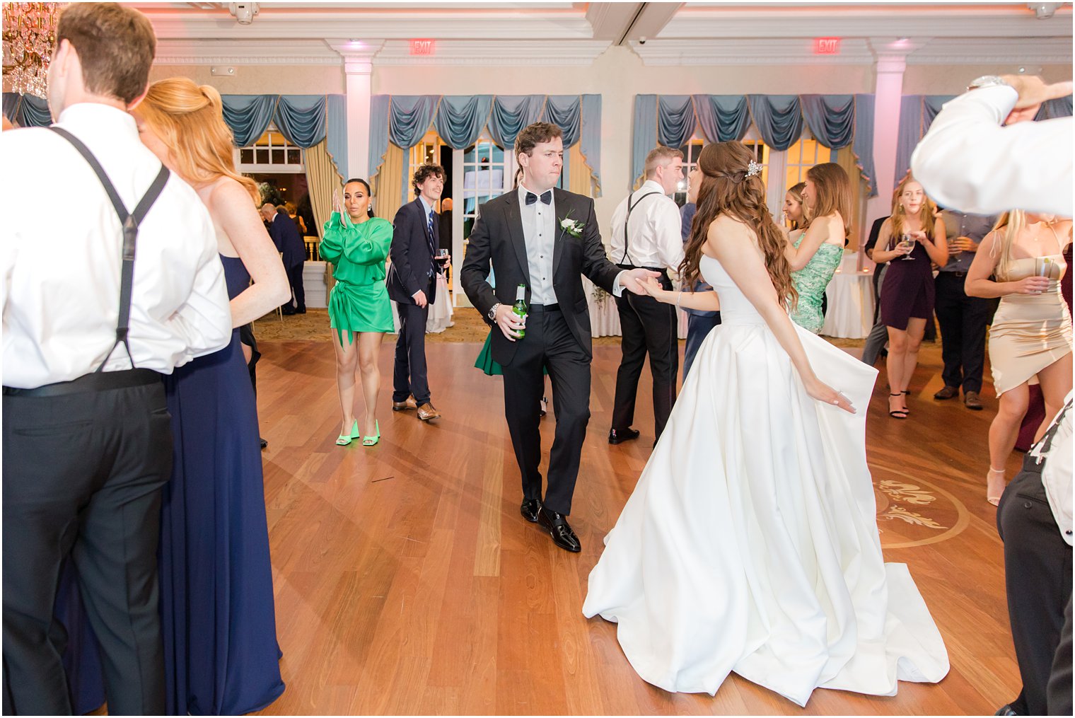 newlyweds dance together during Farmingdale NJ wedding reception