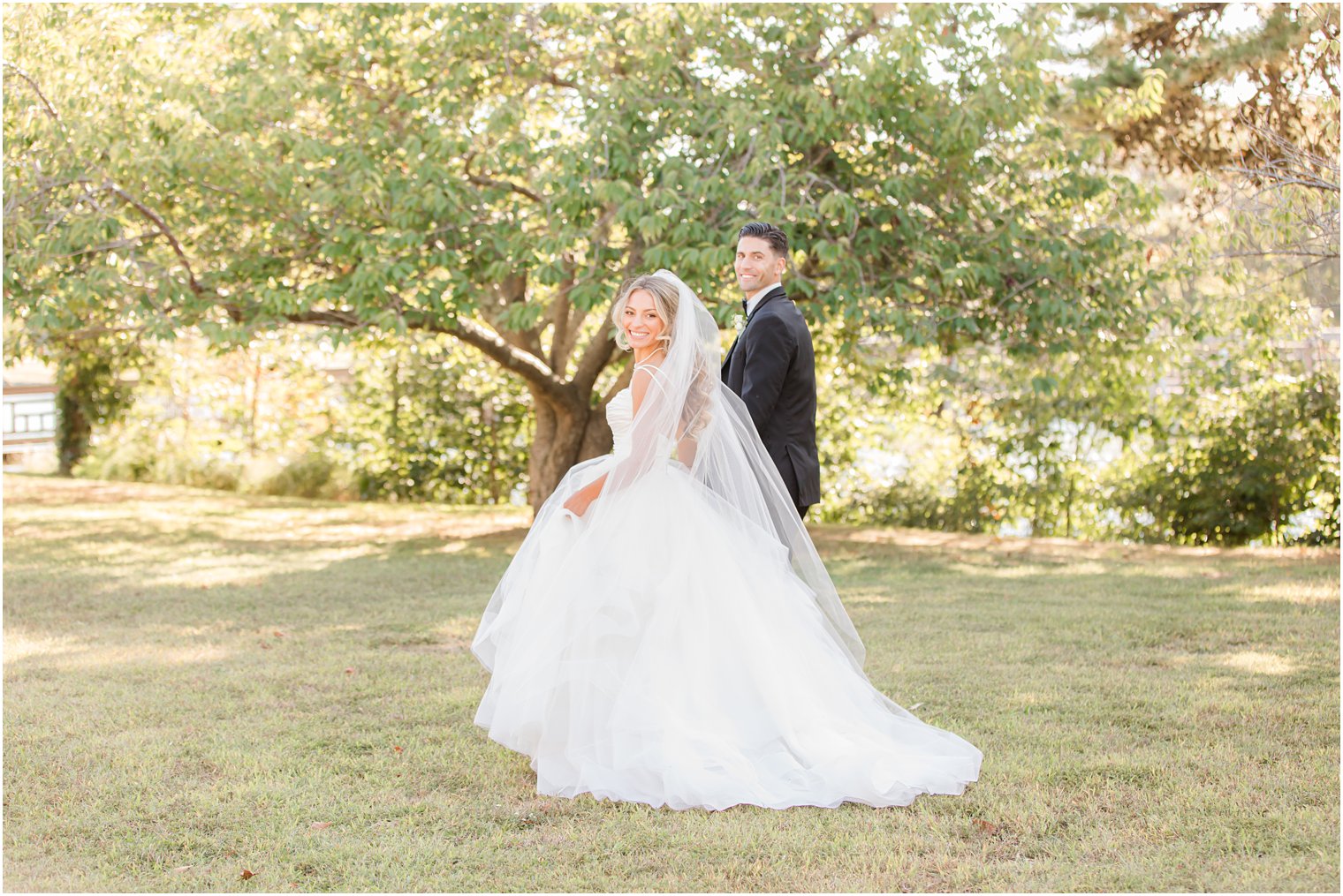 newlyweds walk through Spring Lake NJ