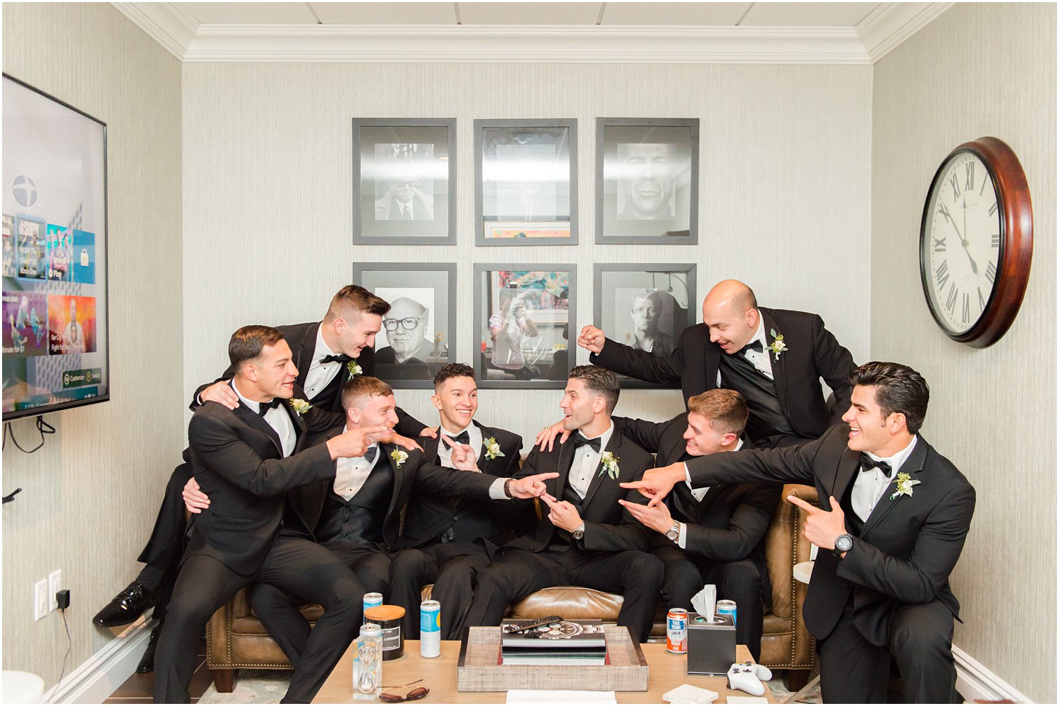 groom and groomsmen goof off during NJ wedding photos