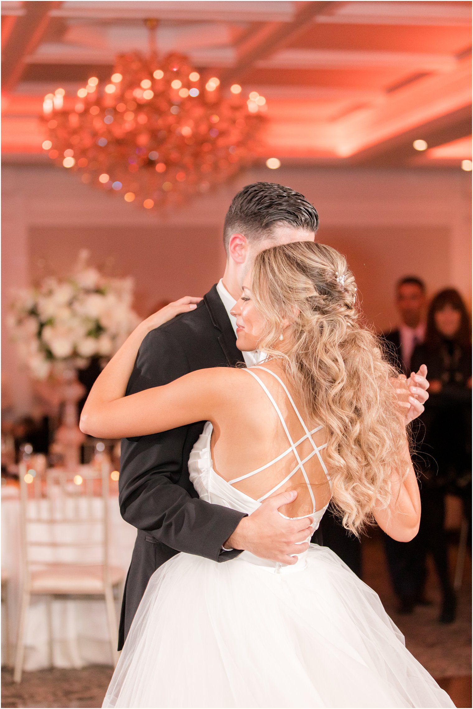 bride and groom dance together during Spring Lake NJ wedding reception 