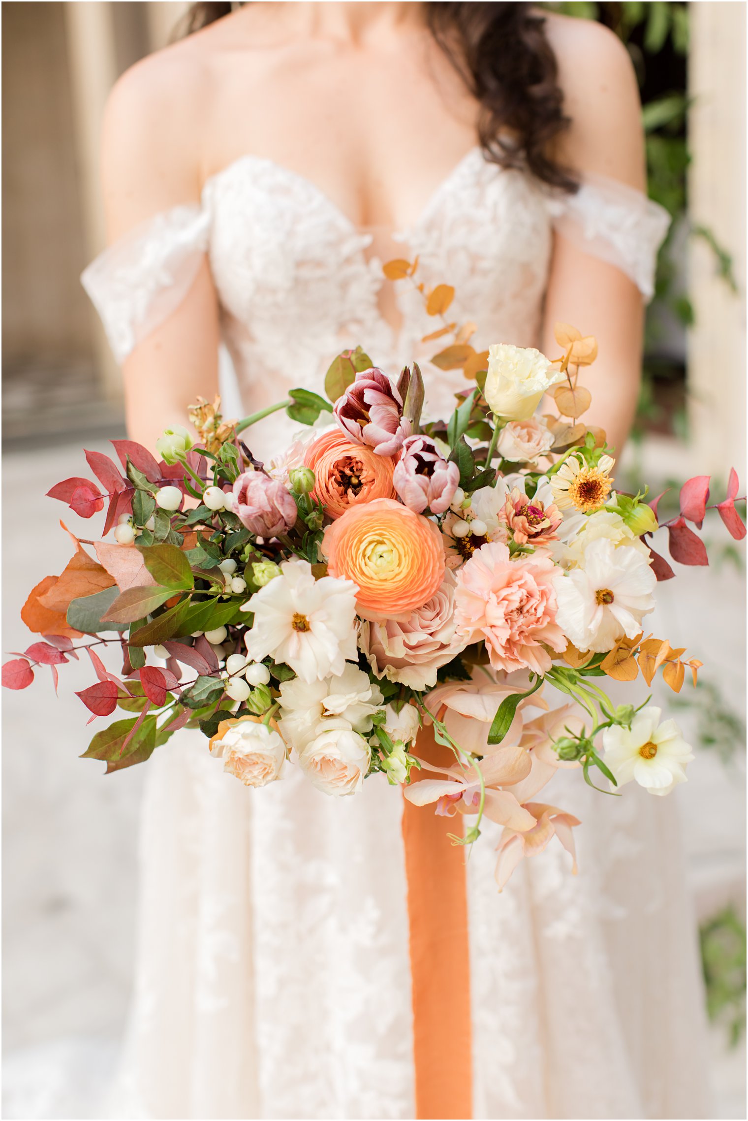bride's bouquet of pink and orange flowers for New York wedding