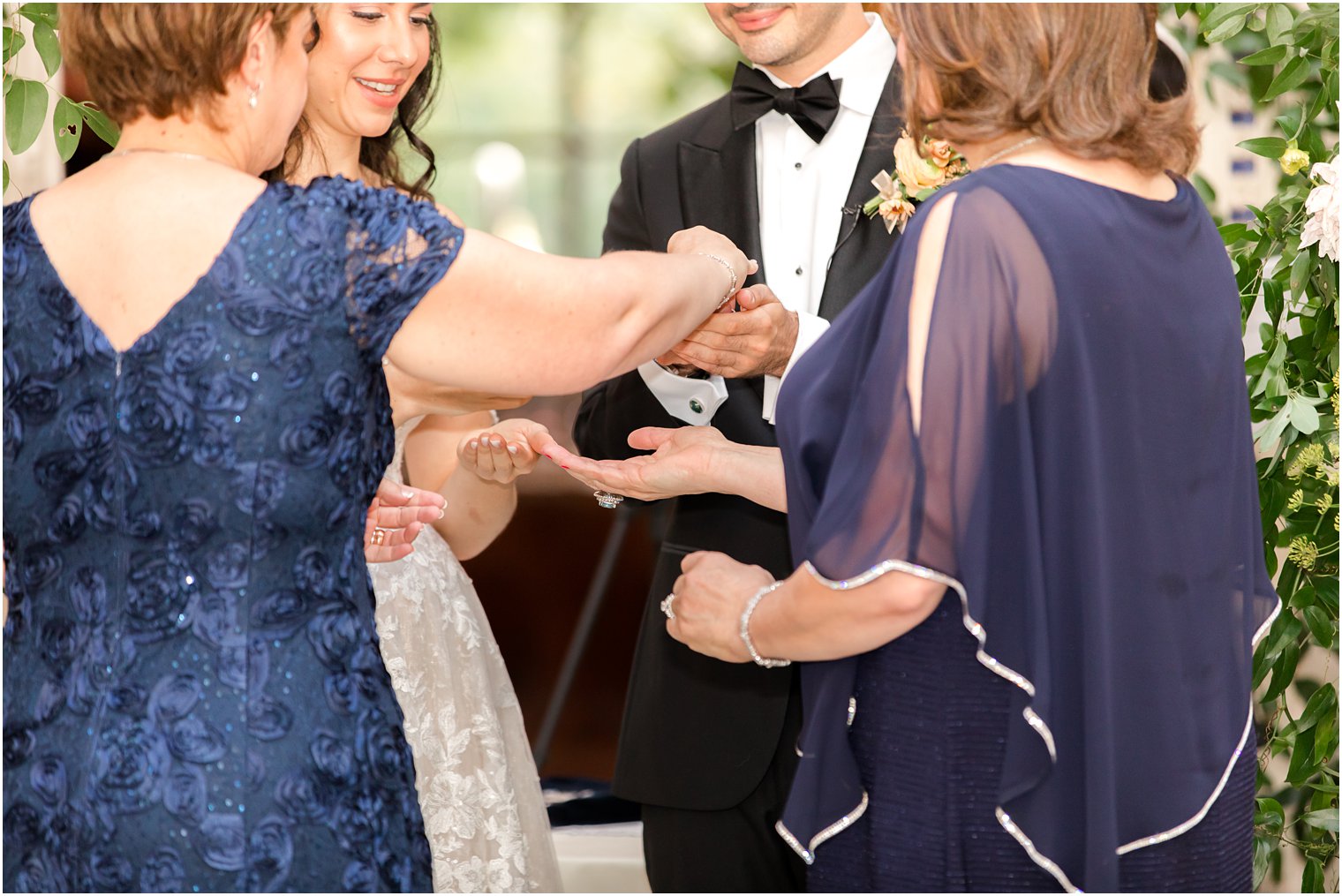 mothers complete ceremony during wedding day at the Village Club of Sands Point