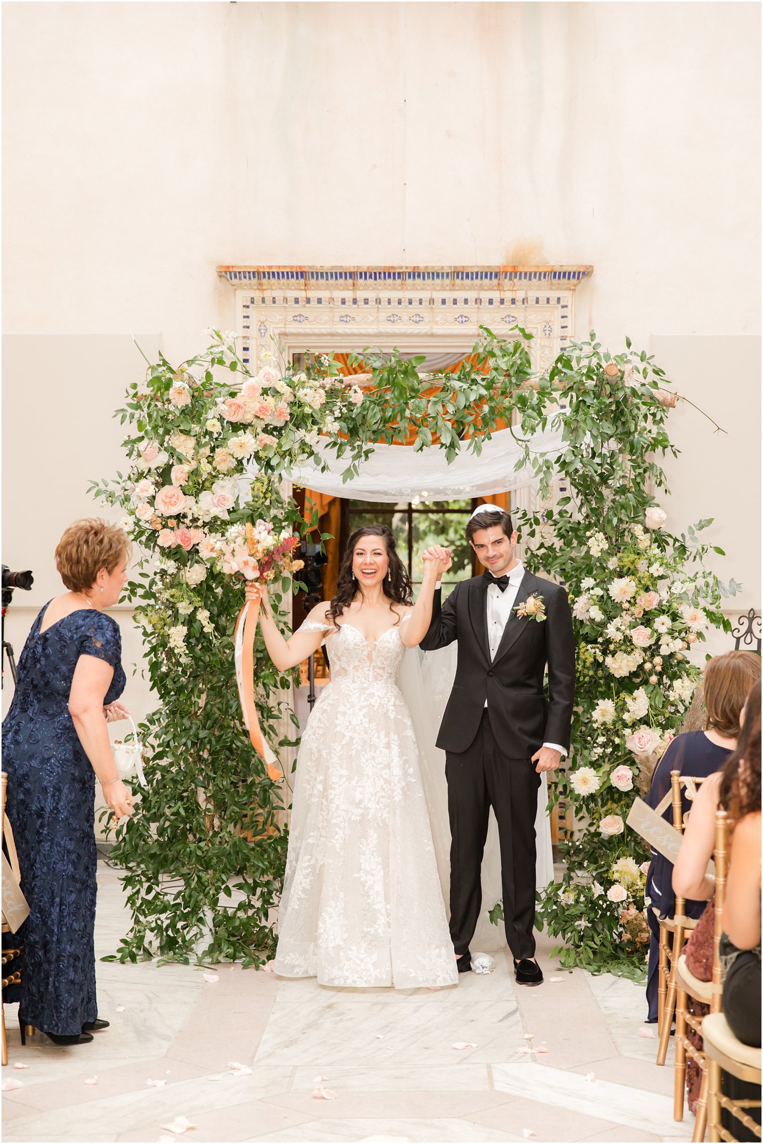 bride and groom cheer after ceremony at the Village Club of Sands Point