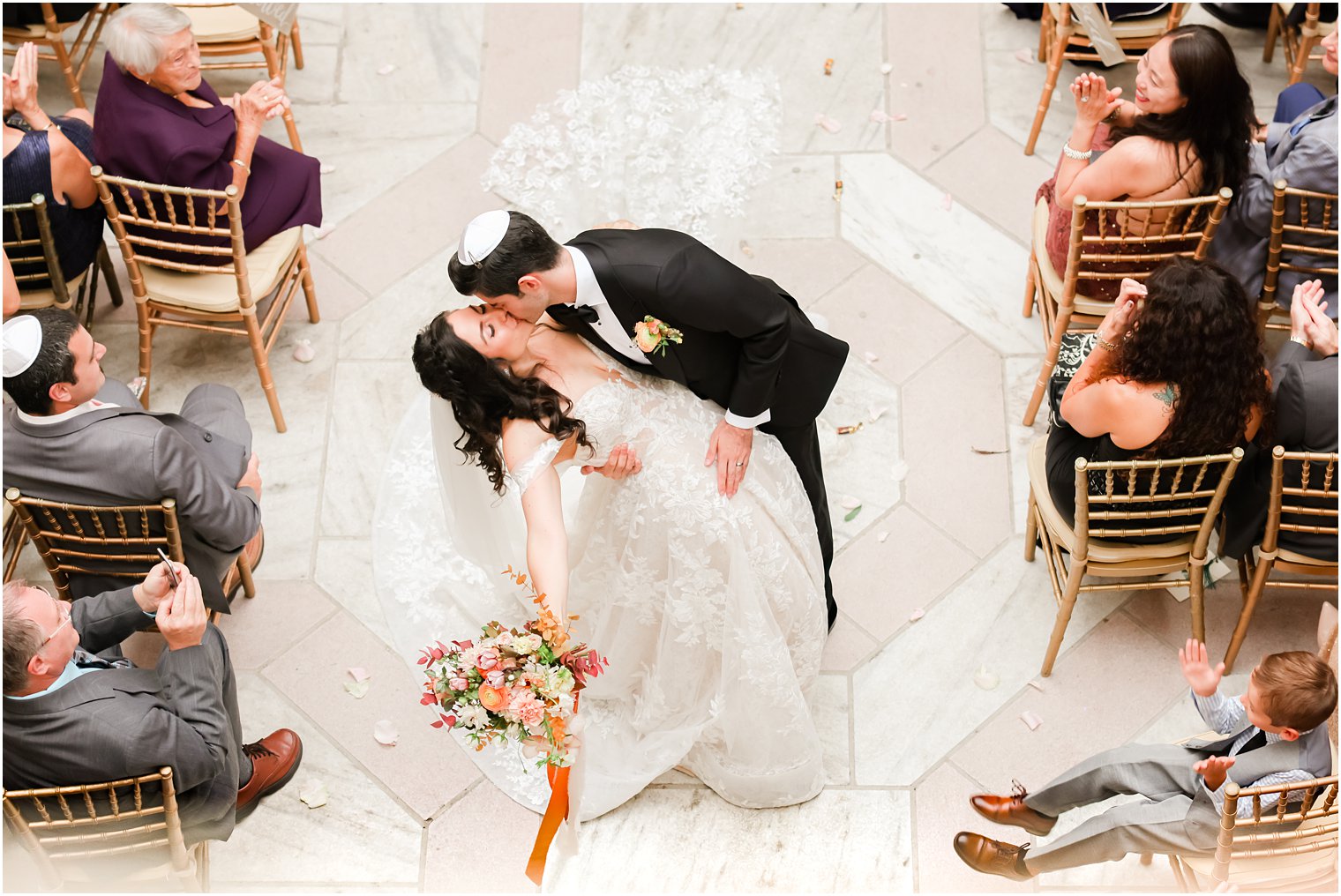 bride and groom kiss after New York wedding ceremony