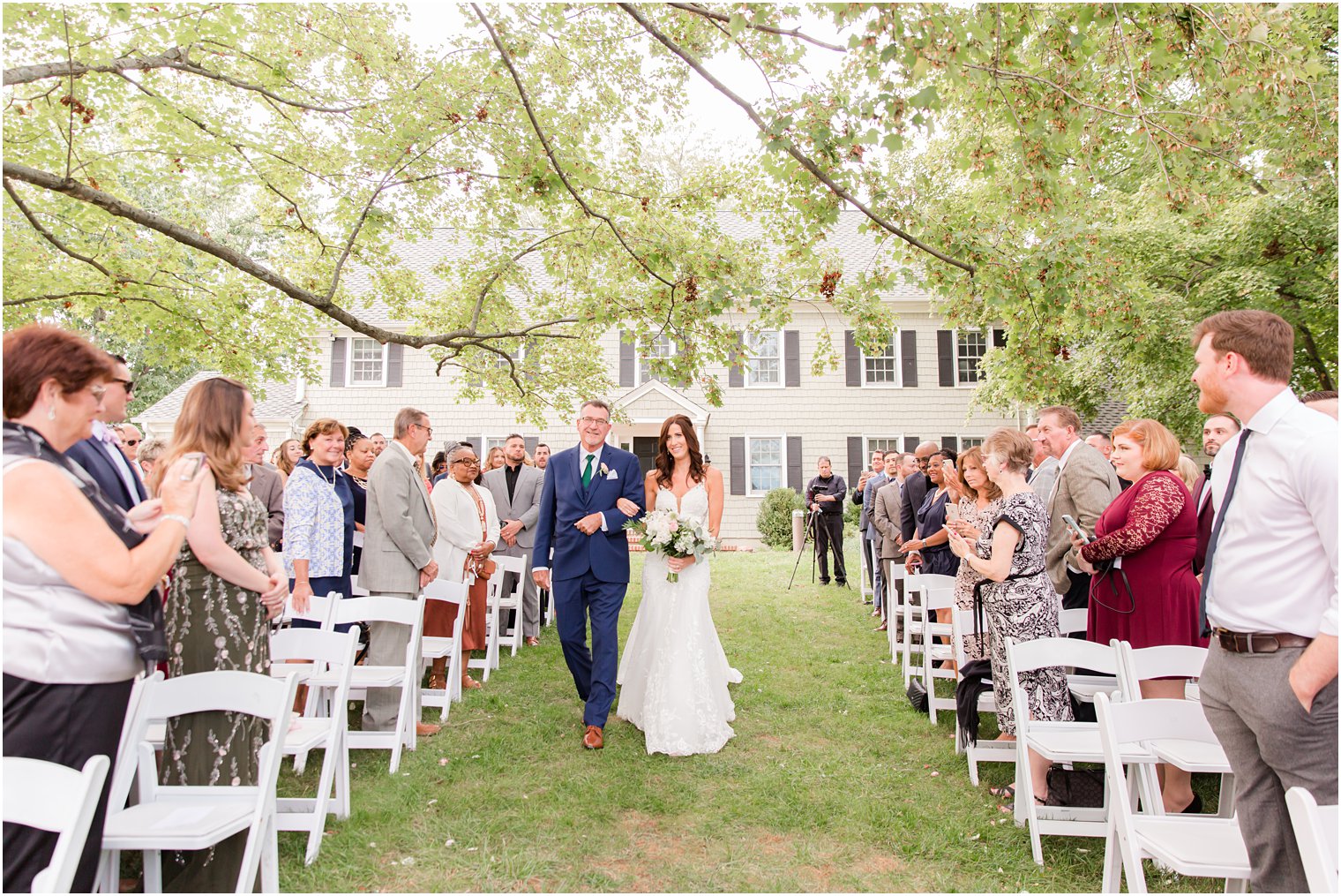 bride walks down aisle at hotel with dad in Princeton NJ