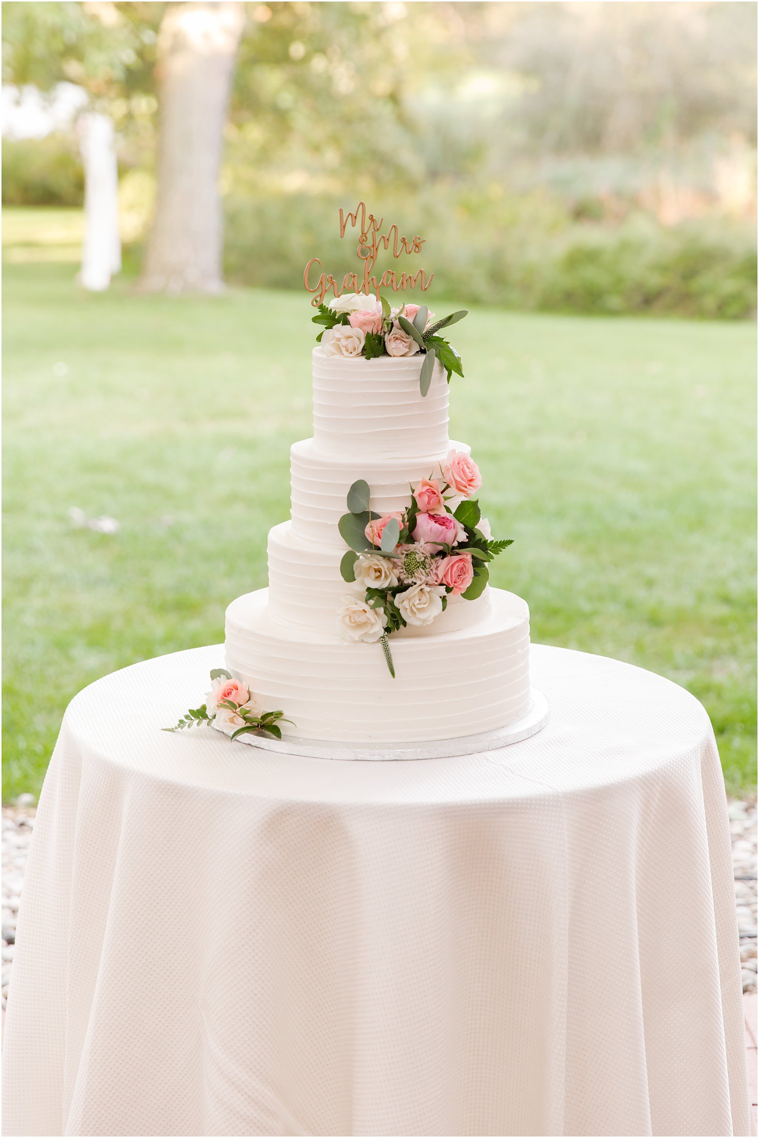 tiered wedding cake with pink roses for Princeton NJ wedding reception