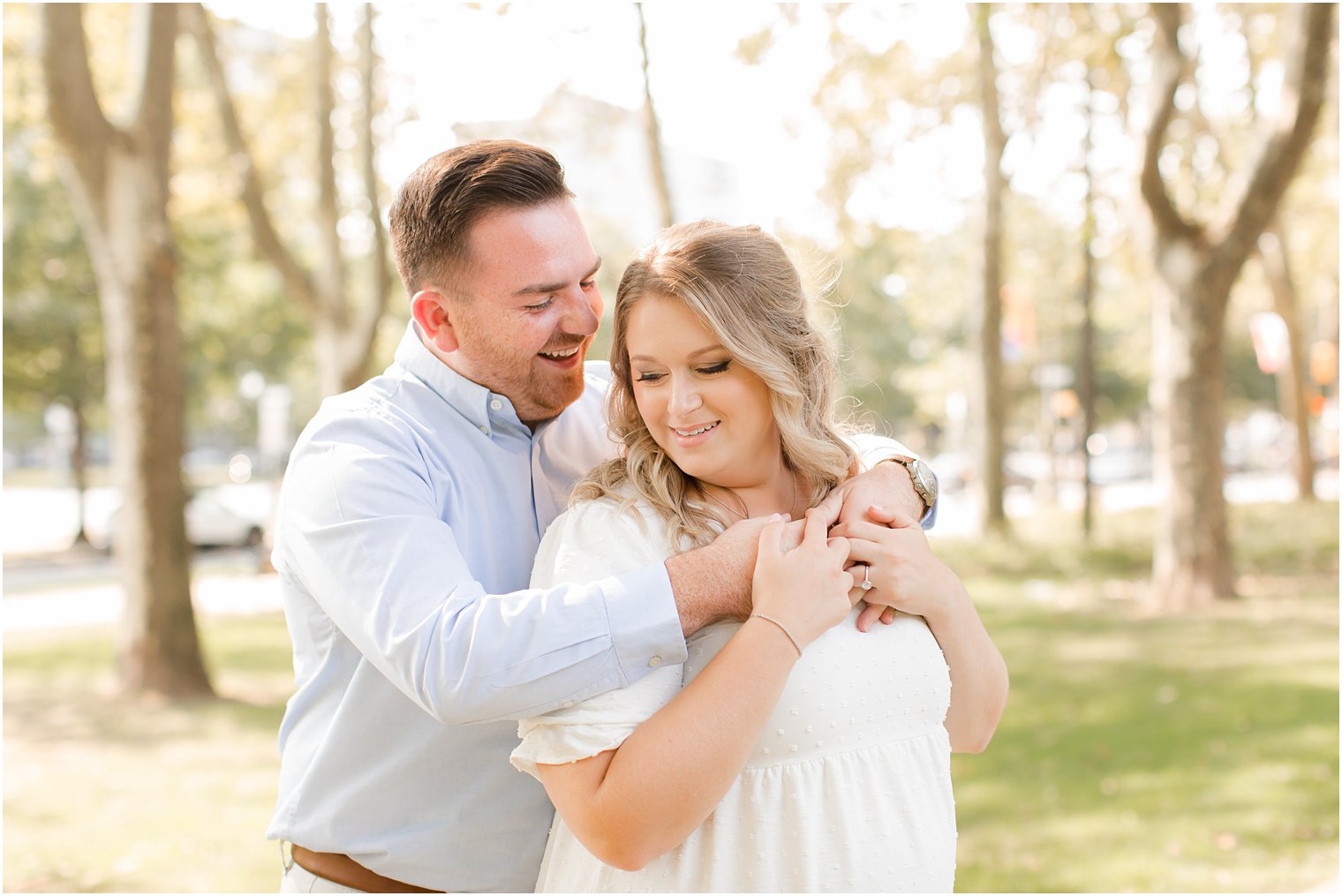 couple hugs during Rodin Museum engagement session