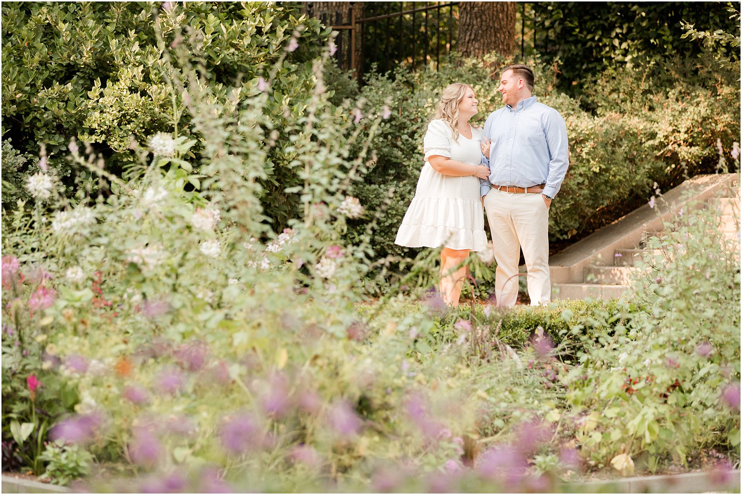 bride and groom walk down steps during Rodin Museum engagement session