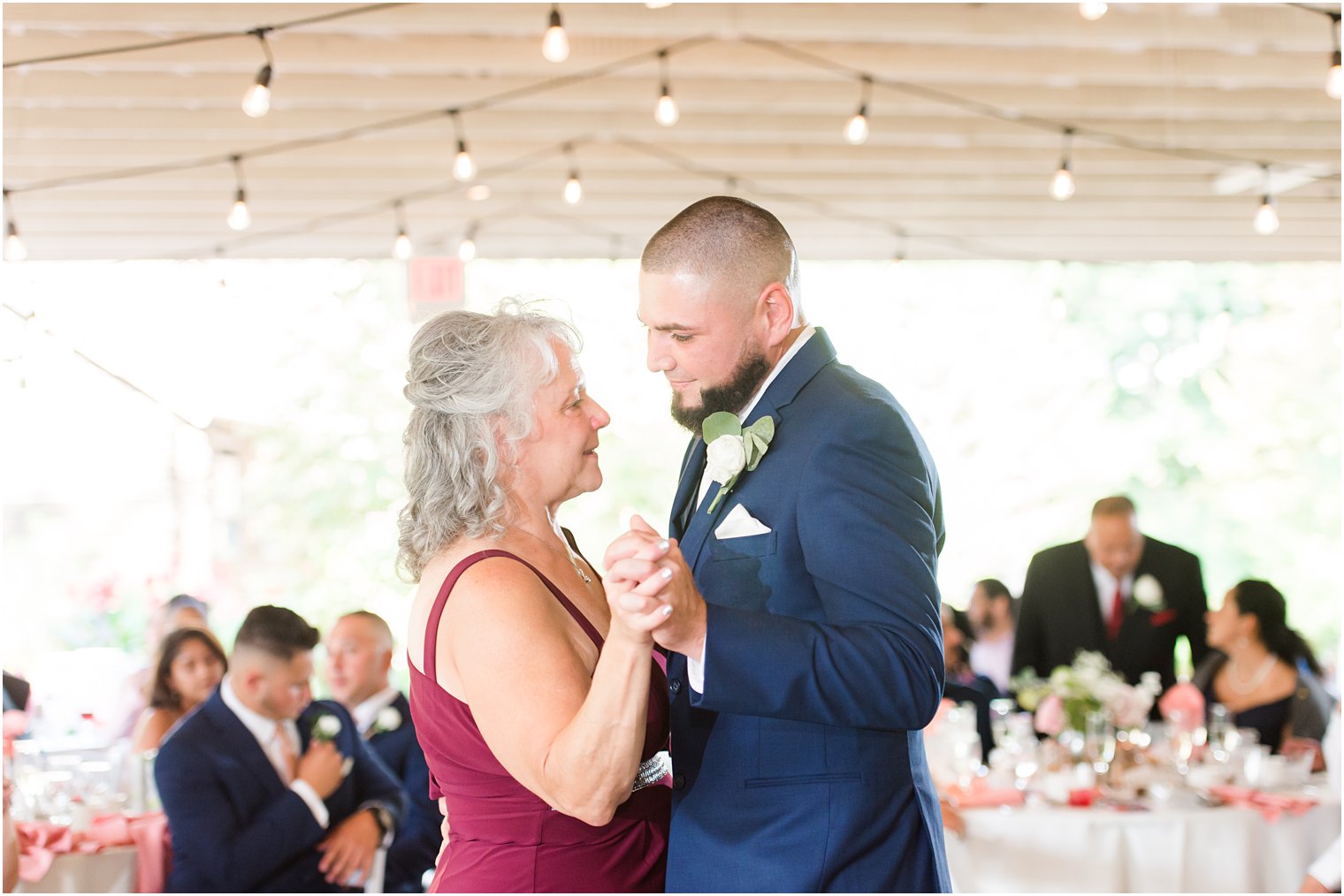 groom and mom dance together during NJ wedding reception 
