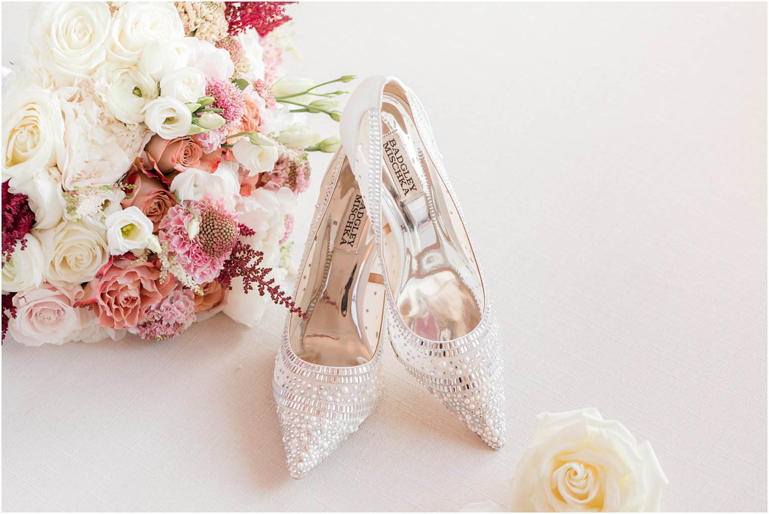 bride's Badgley Mischka shoes with pearls 
