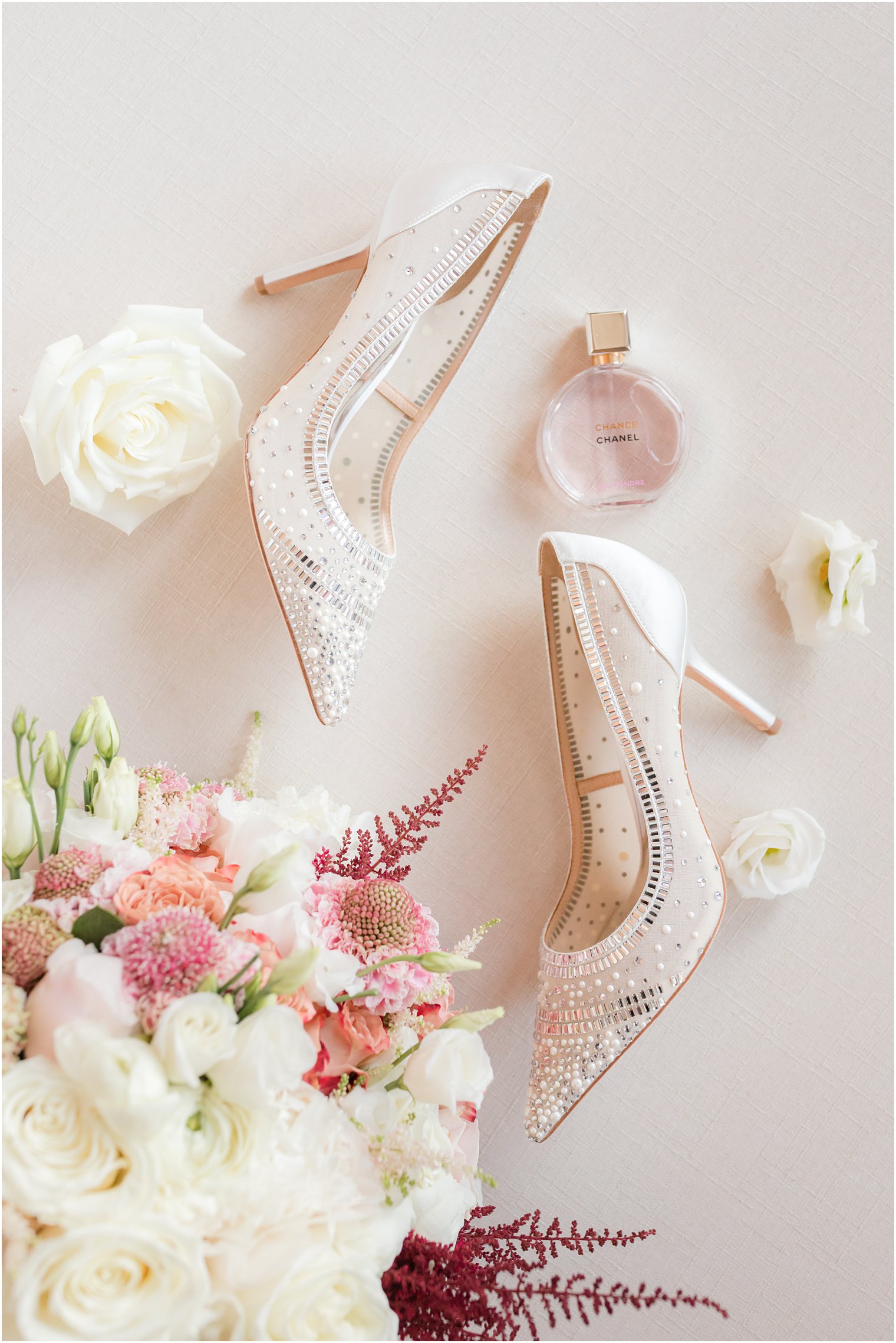 bride's ivory wedding shoes with pearls from Badgley Mischka 