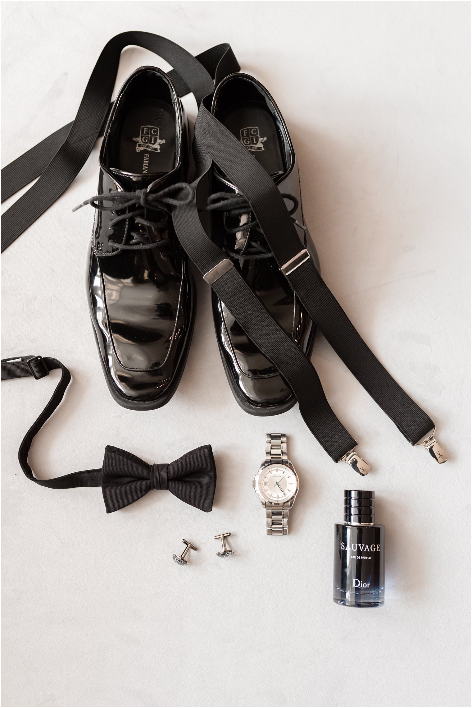 groom's black shoes and bowtie for timeless wedding at the Molly Pitcher Inn